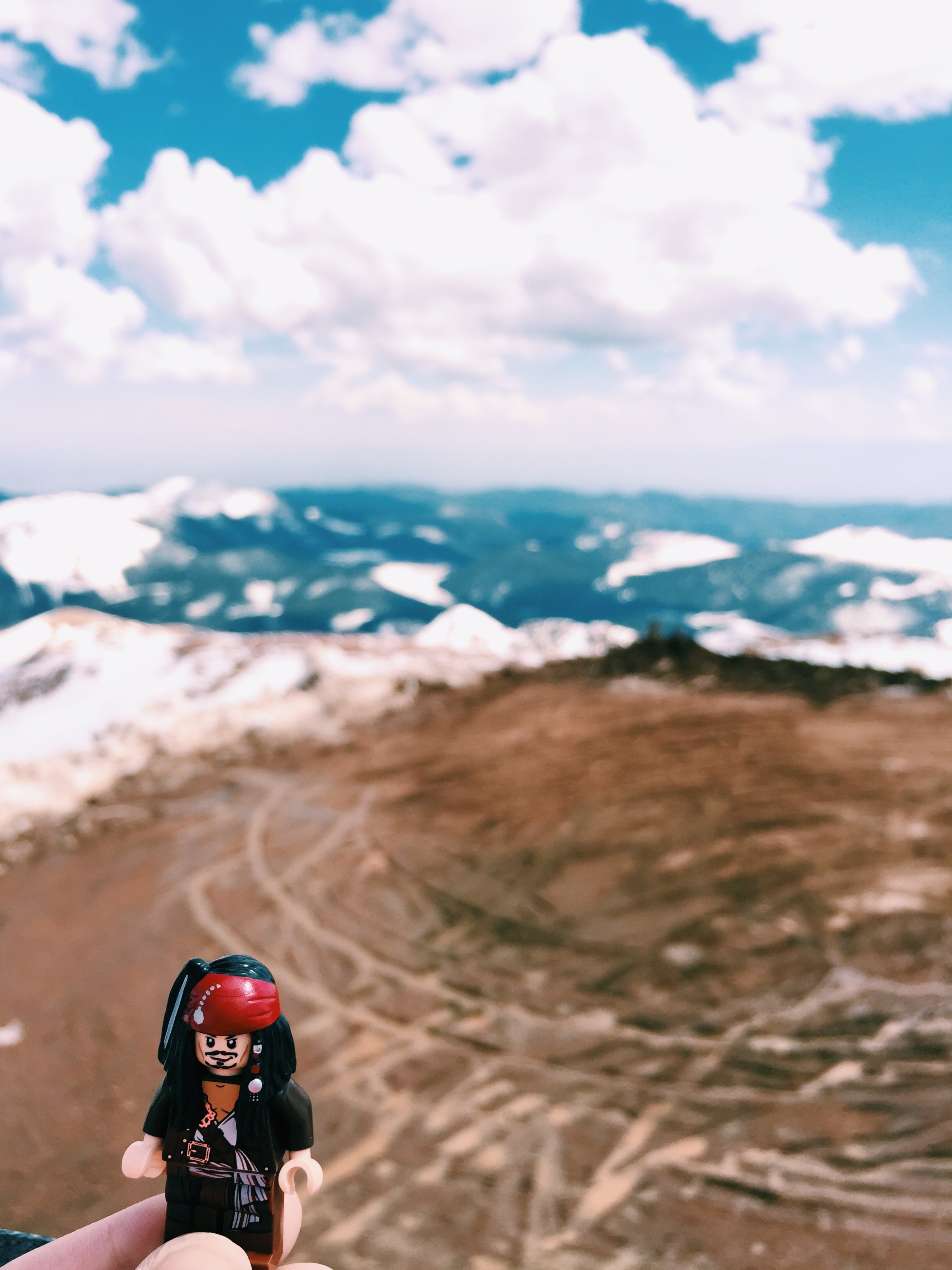 Jack enjoying the view from a snowy Pike's Peak. 