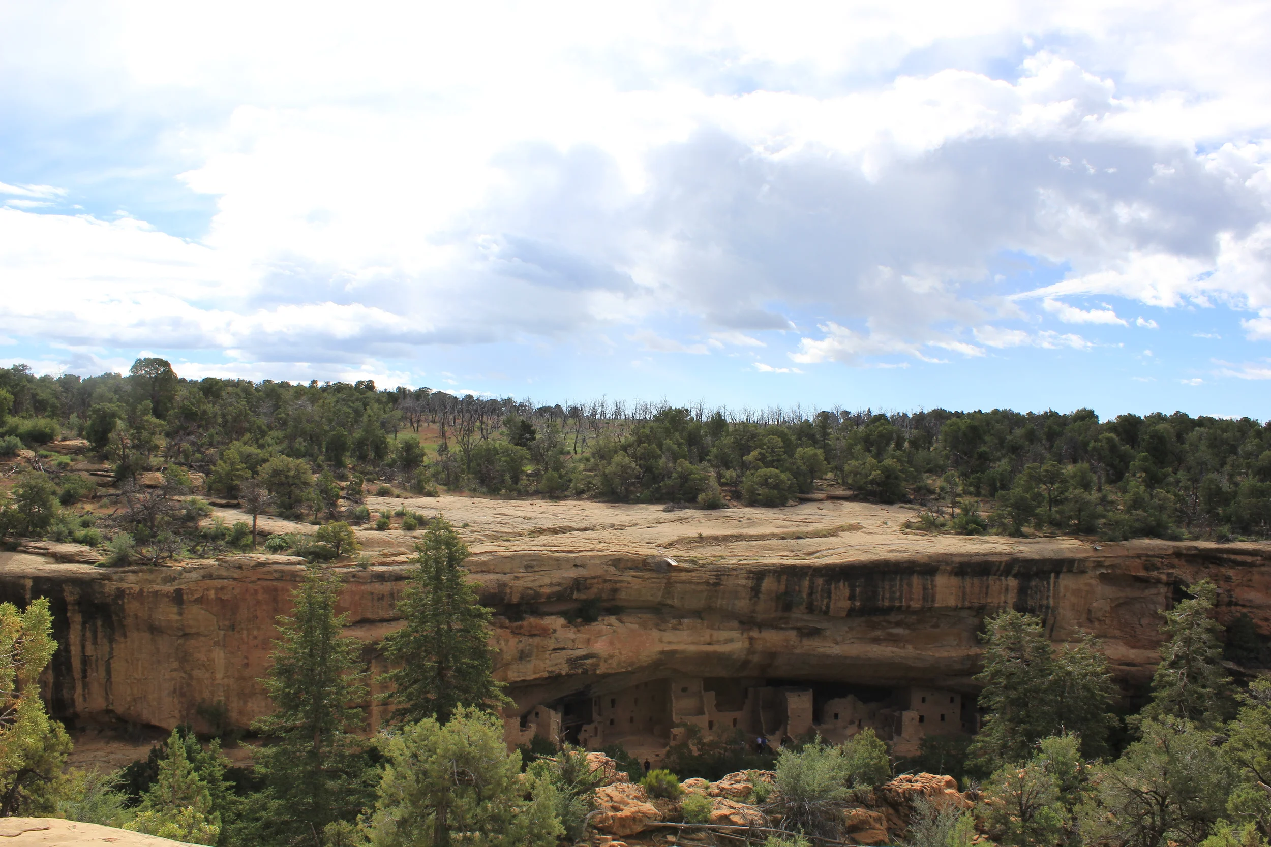 You see those dwellings down there? That's right. People lived in those!