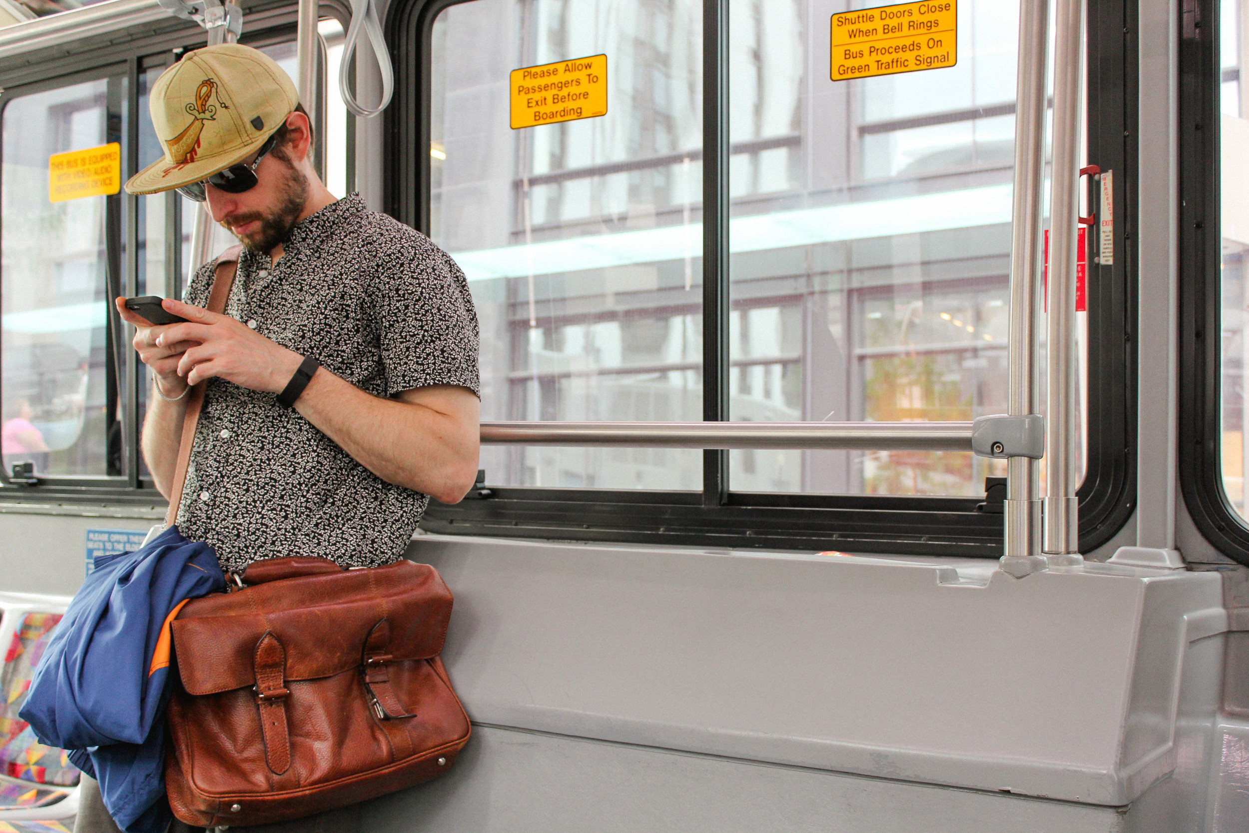A random stylish man on the bus.