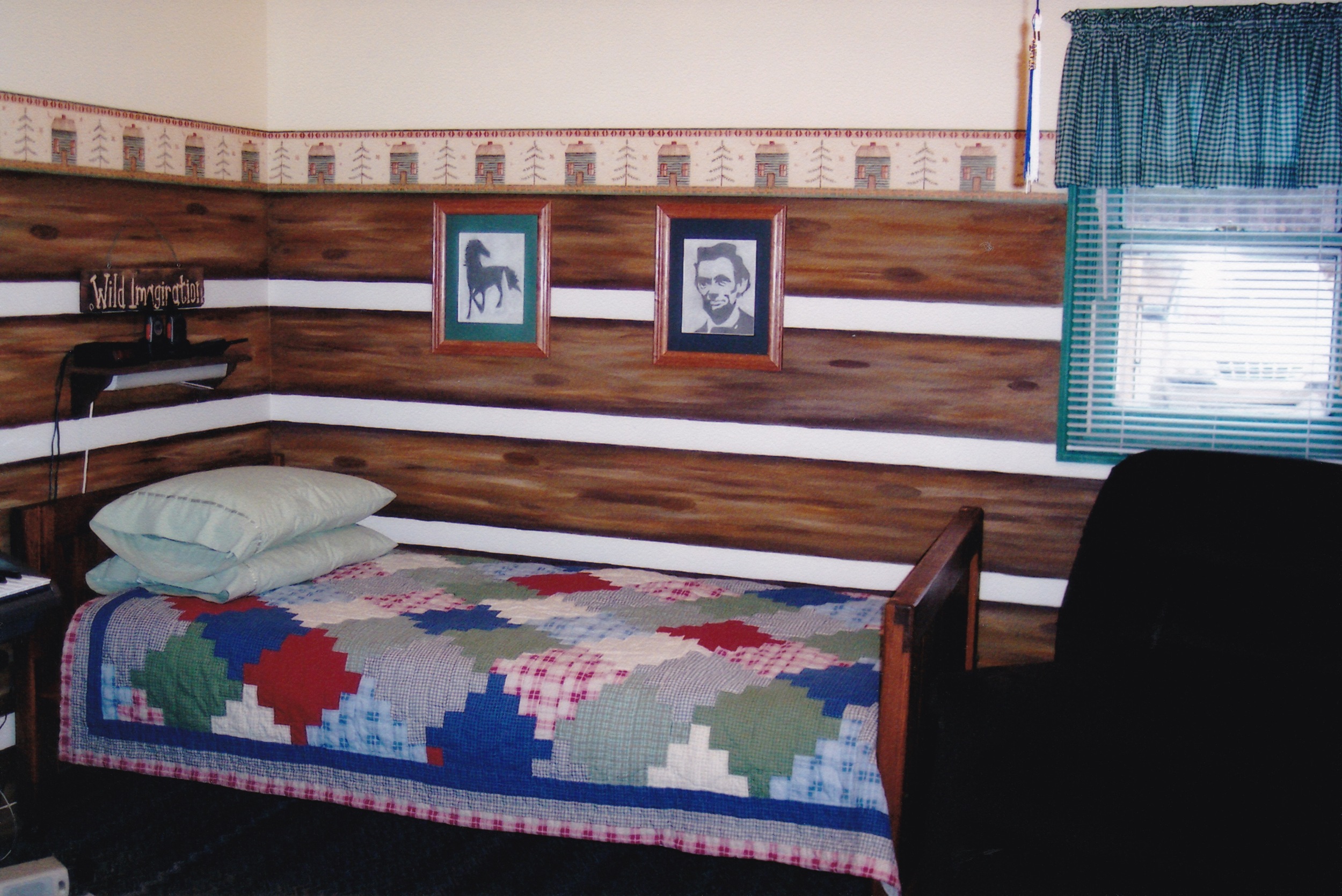 THE CLOSEST WE CAME TO A LOG CABIN: FAUX LOGS PAINTED IN RYAN'S BEDROOM
