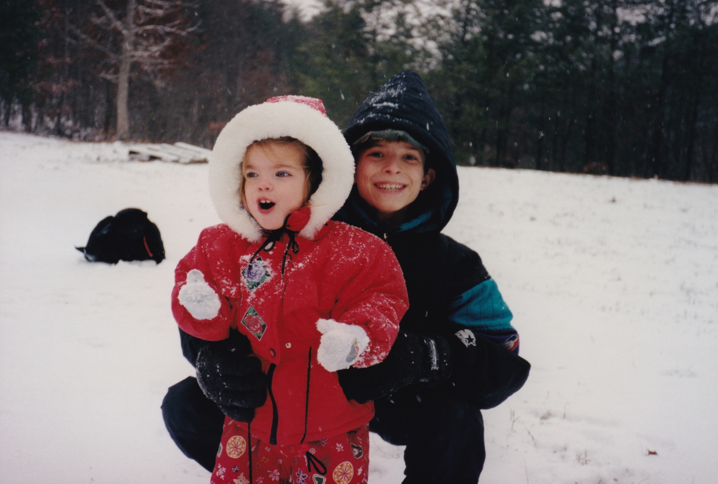 TESSA AND RYAN ENJOYING THE FIRST SNOW AT OUR NEW HOME