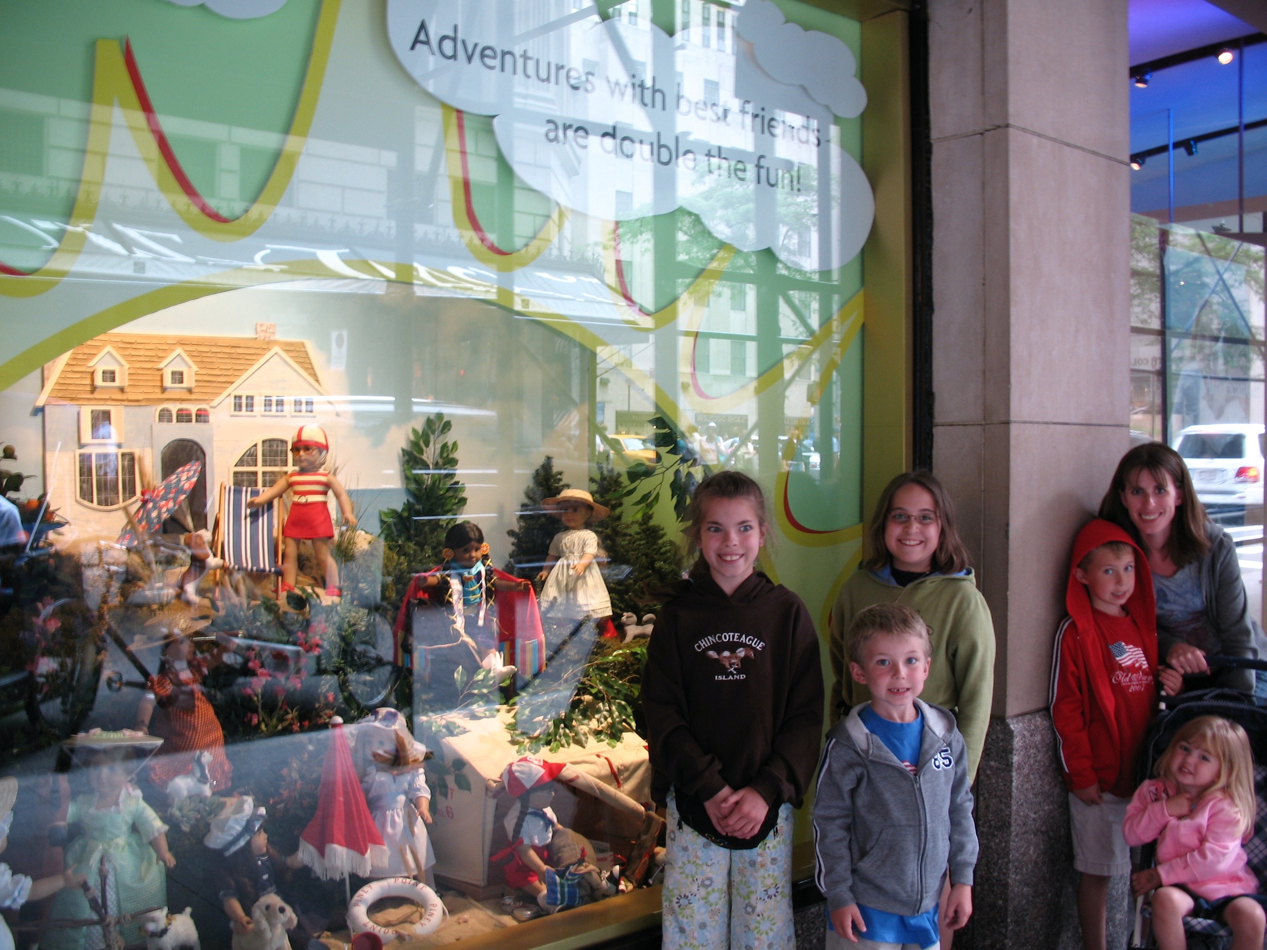 kelly and the kiddos at the american girl store in new york city--a quick detour on our trip up the coast