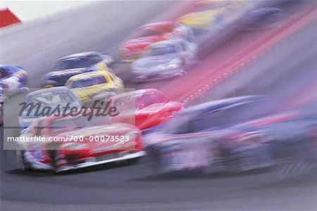 700-00073523em-Blurred-Race-Cars-on-Track---.jpg