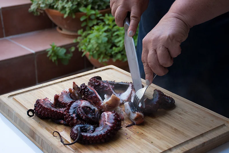 Cutting-the-cooked-octopus.jpg