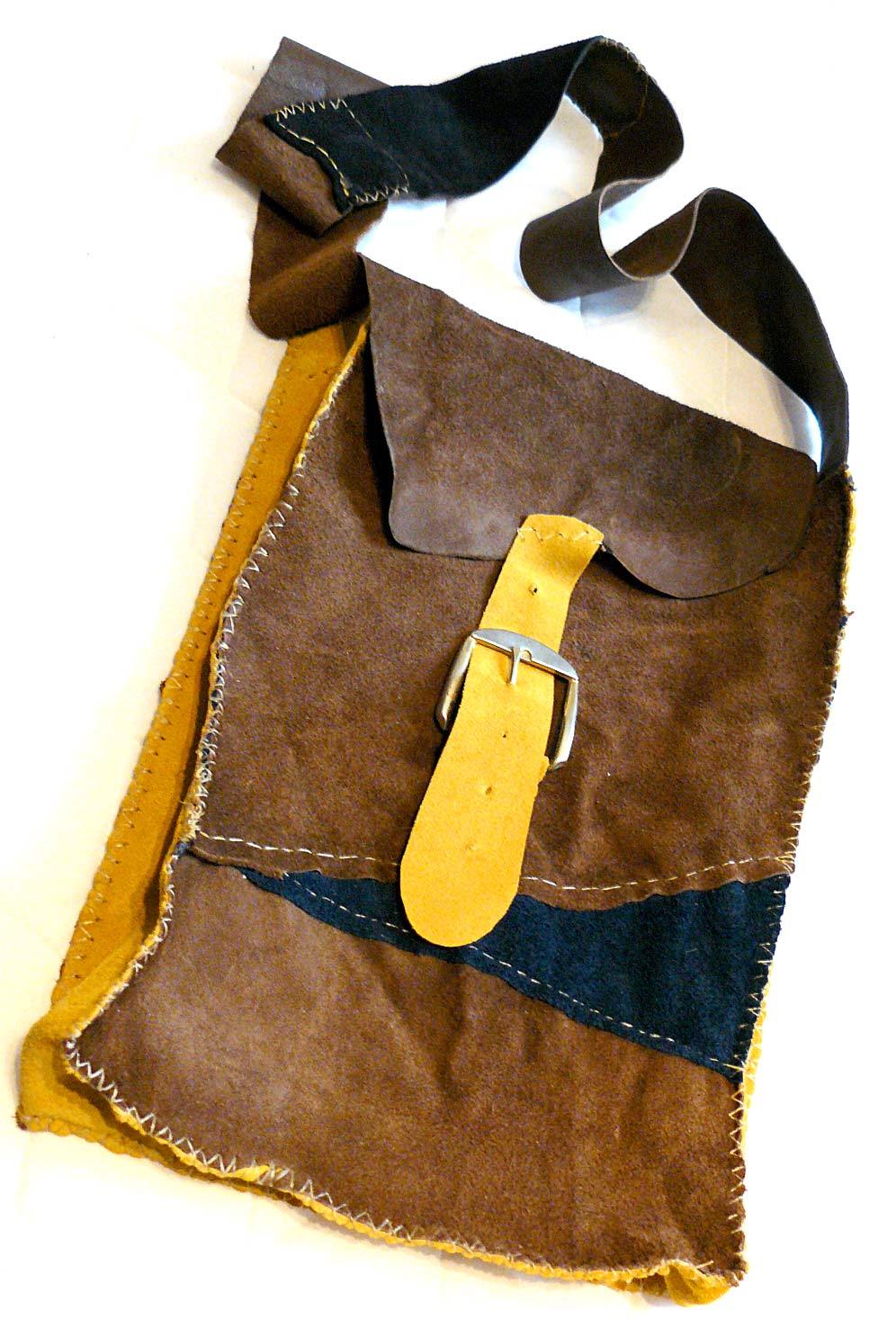   leather bag hand-stitched from upholstery leather scraps.  