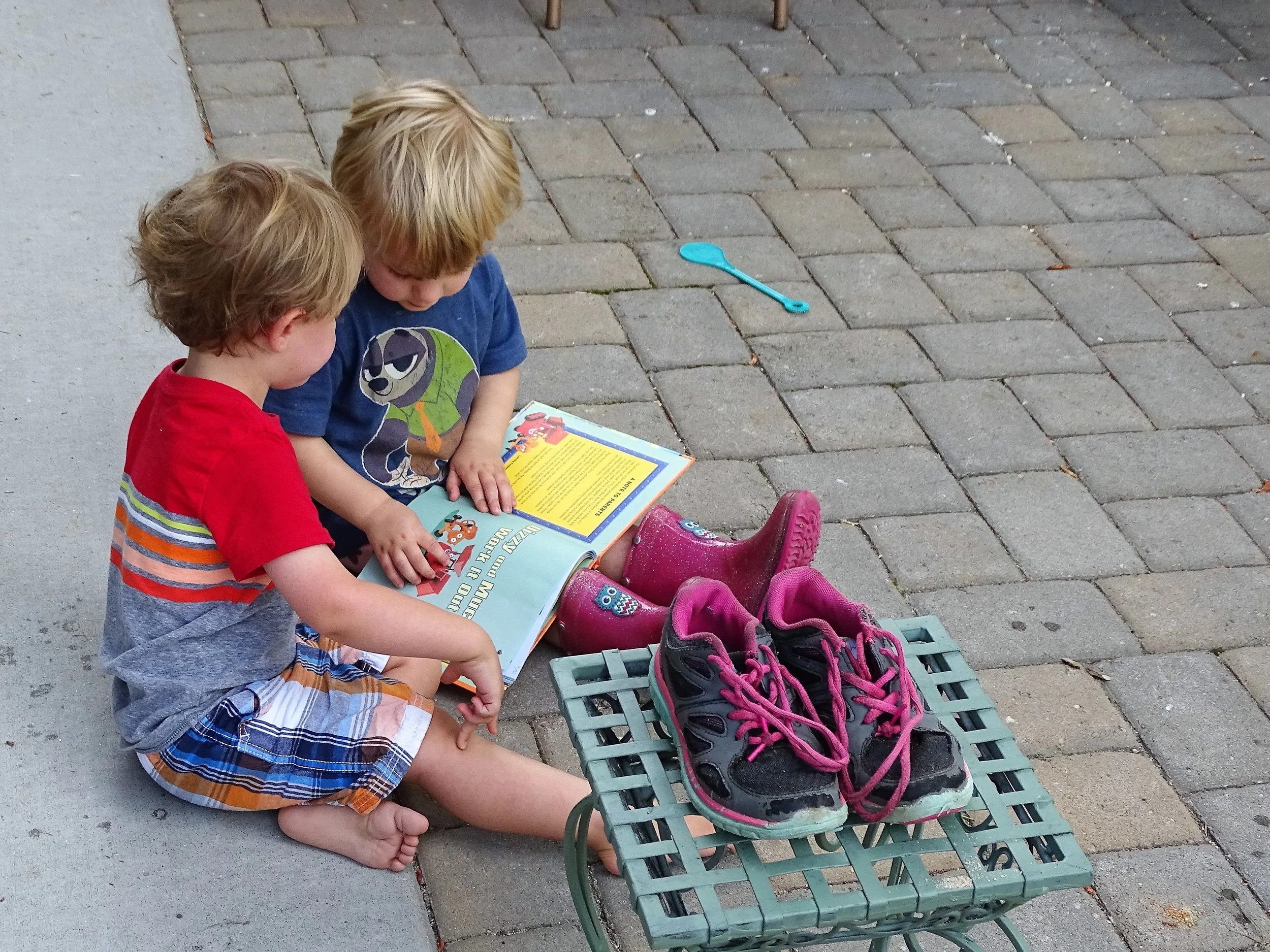 "Reading" to his cousin