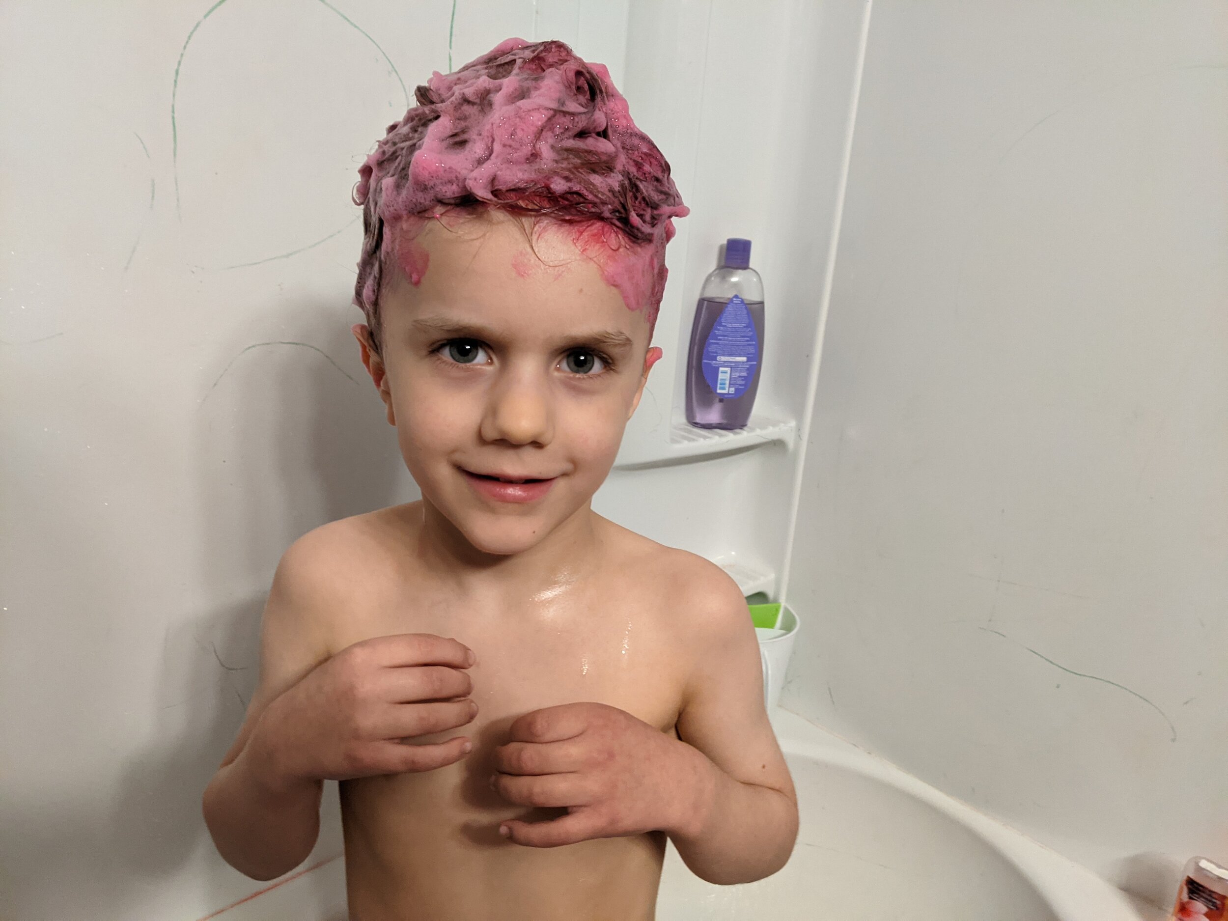 Dying his hair pink