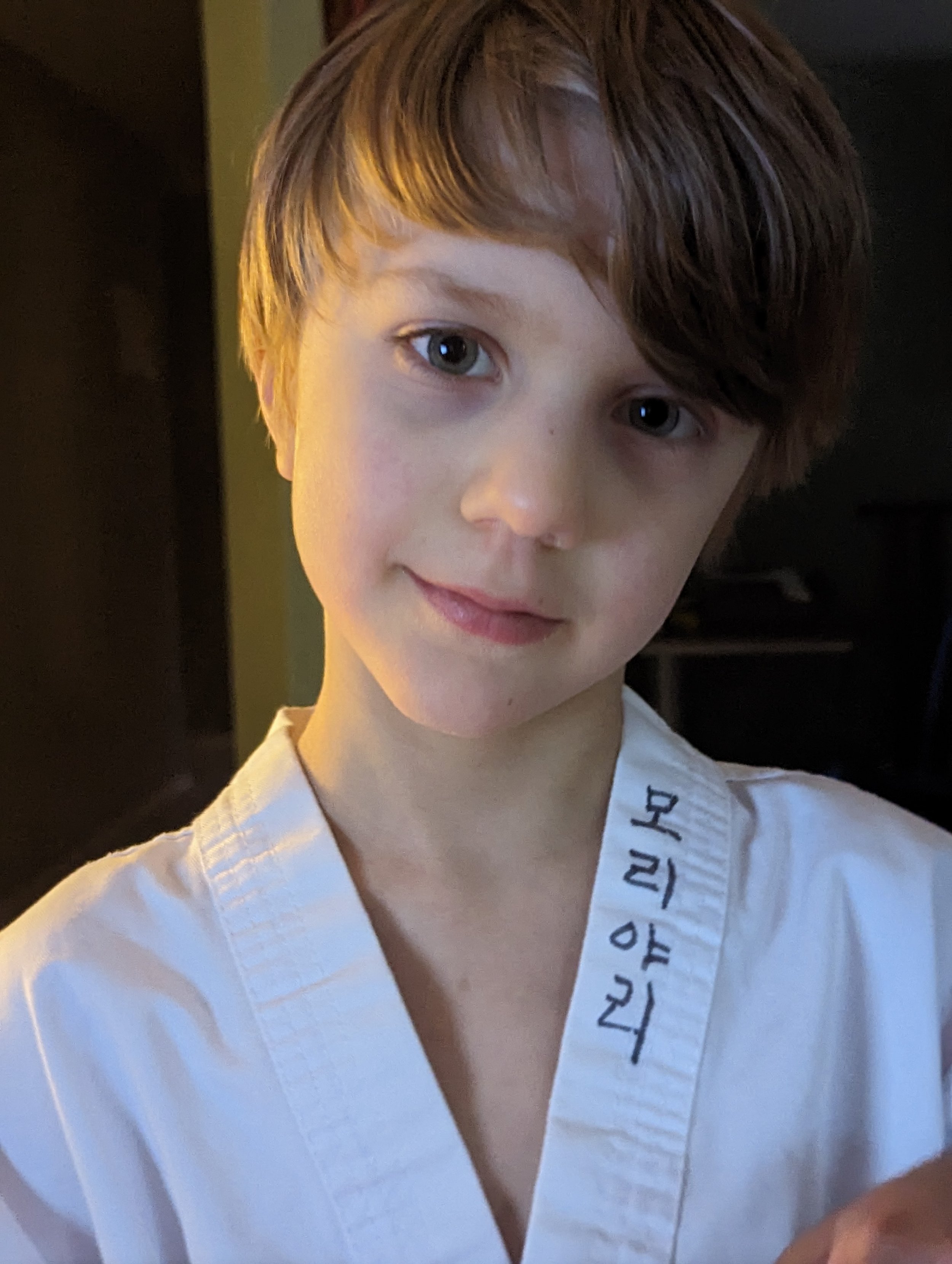 in his dobok (uniform)