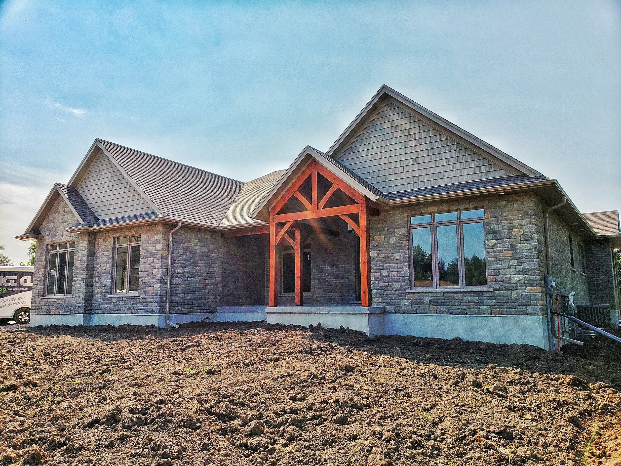 New Home Rural New Build Timber Framed Front Porch with Stone and Brick