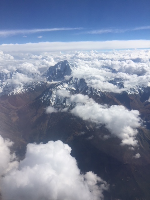 Flying into Cusco, Peru with mountain peaks over 18,000'
