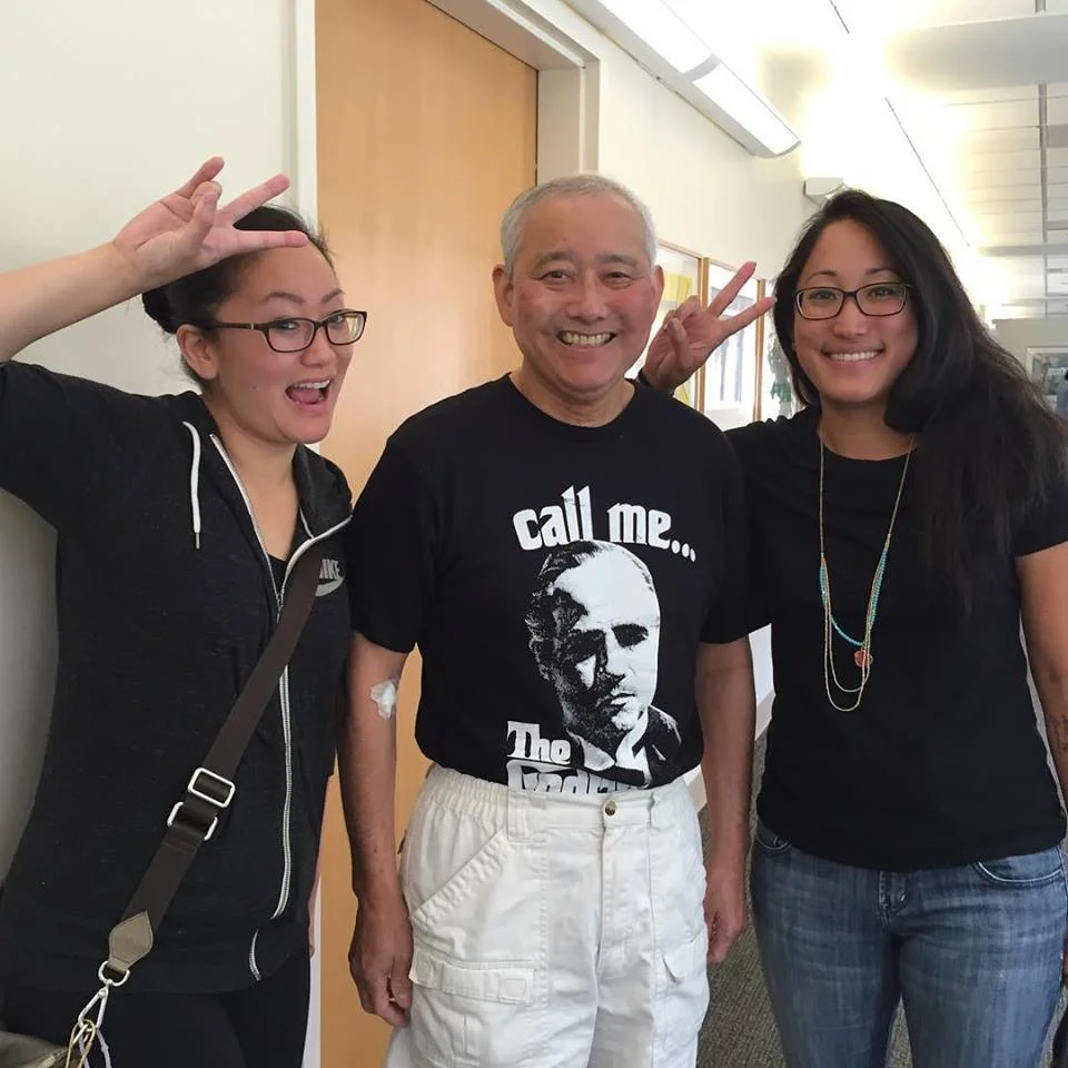 Accompanied by his two daughters, Alysa (left) and Mari (right), Al leaves his latest doctor's appointment with good news that his cancer is shrinking.