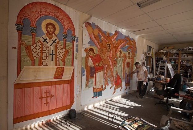Fr. Theodore paints in studio
