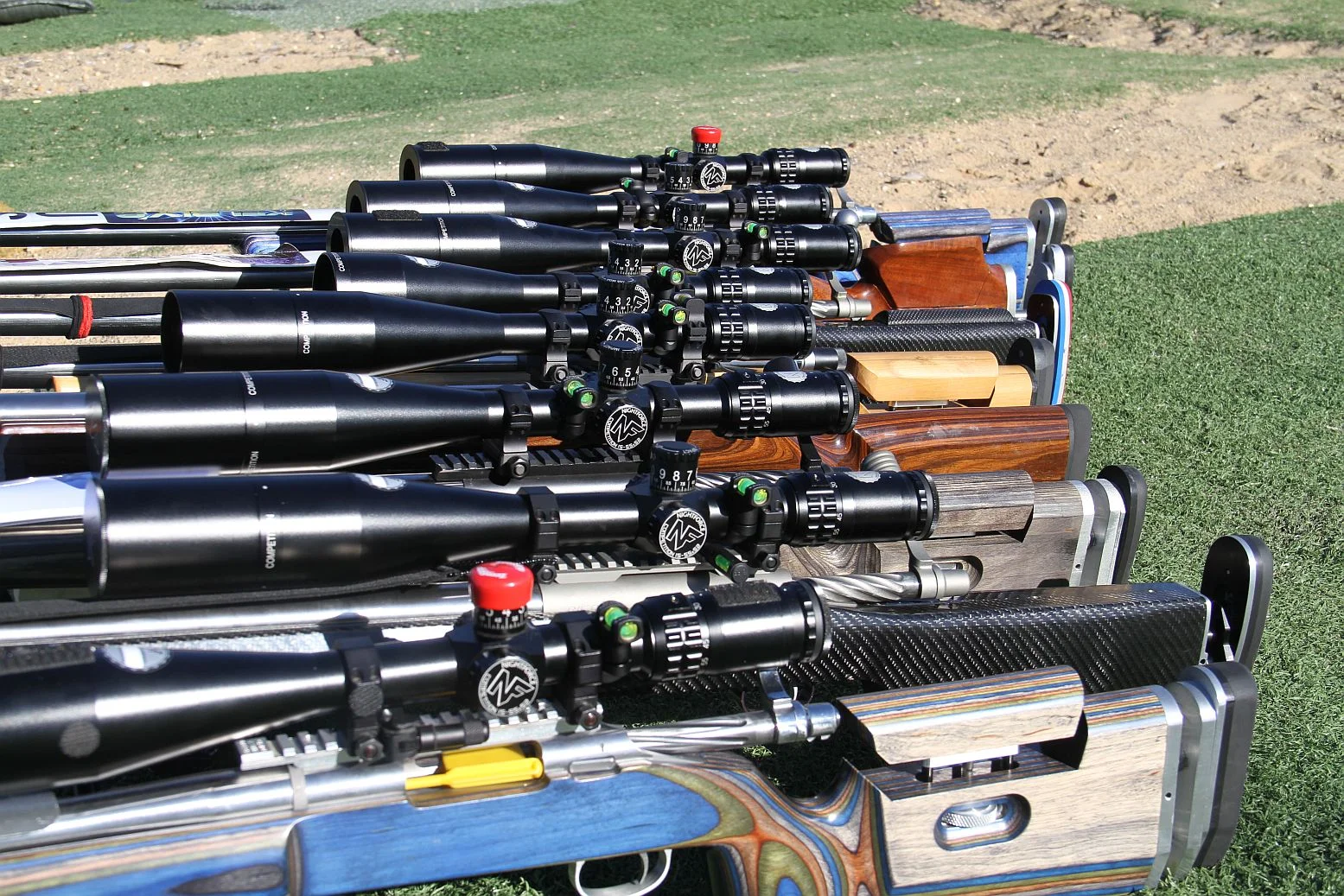 Team rifles all sporting our new Holland Levels and Nightforce Scopes.