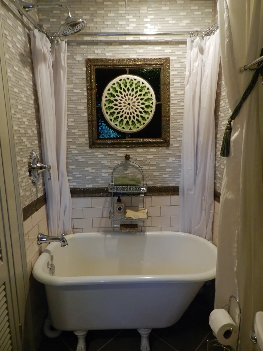 Gothic Window w-glass surr & ornate frame install.jpg