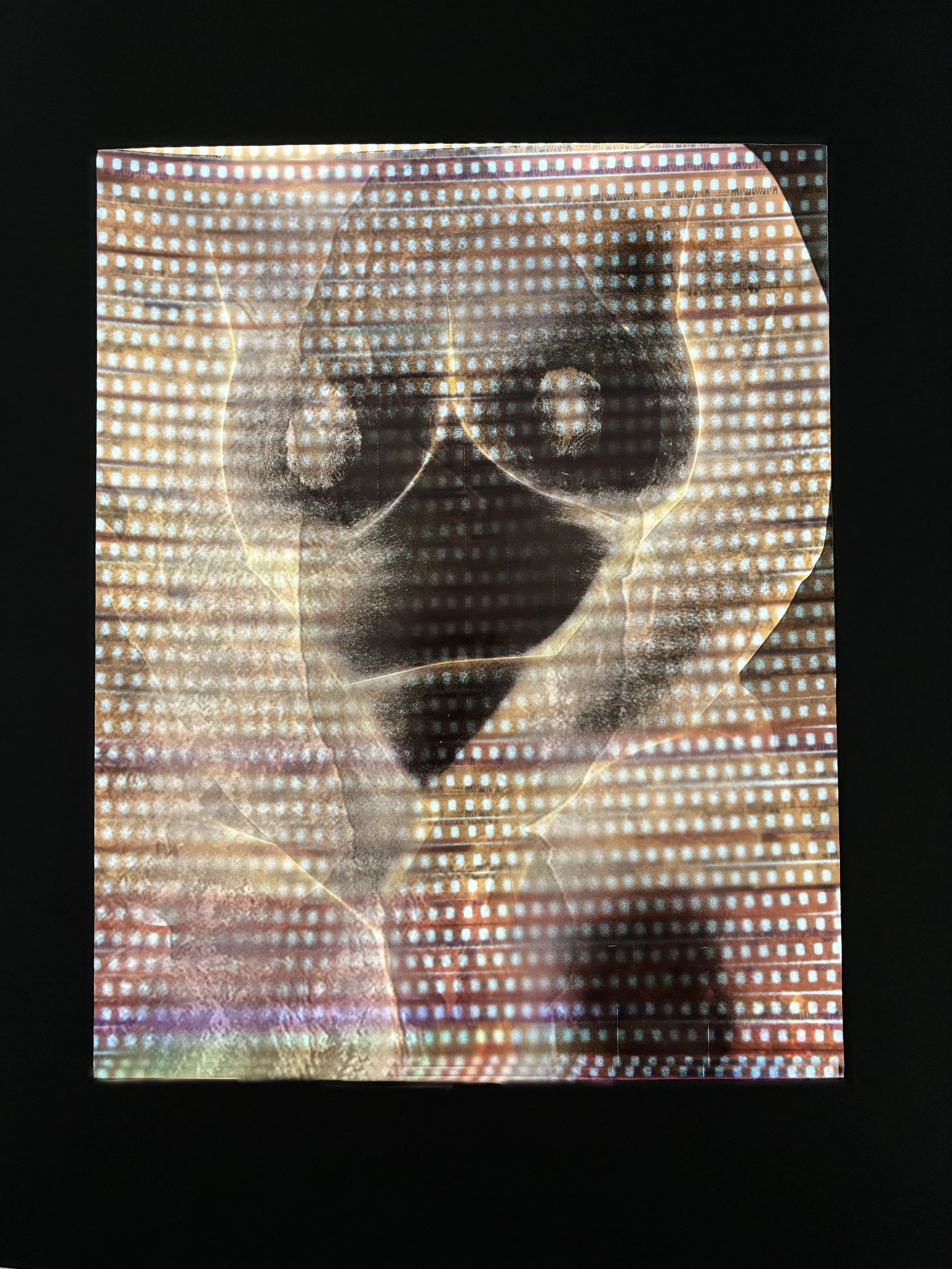 After Brandt and Watkins 2, 2026, archival pigment print on transparency, archival pigment print on backlight film, 35mm negatives, LEDs, 14" x 11" 