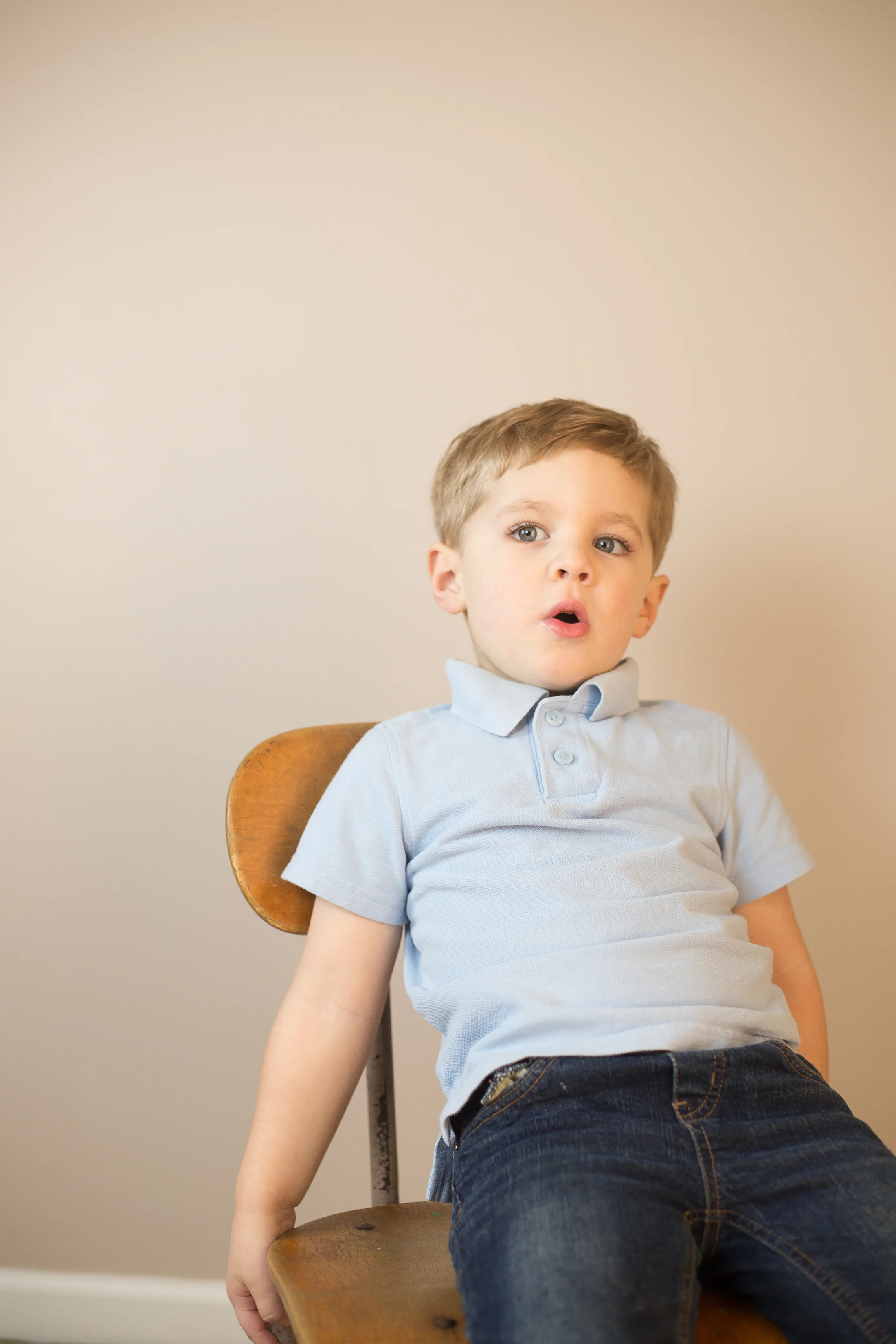 When he told me he doesn't like wooden chairs since they make his butt hurt...hahaha i love kids! Which resulted in the shot below.