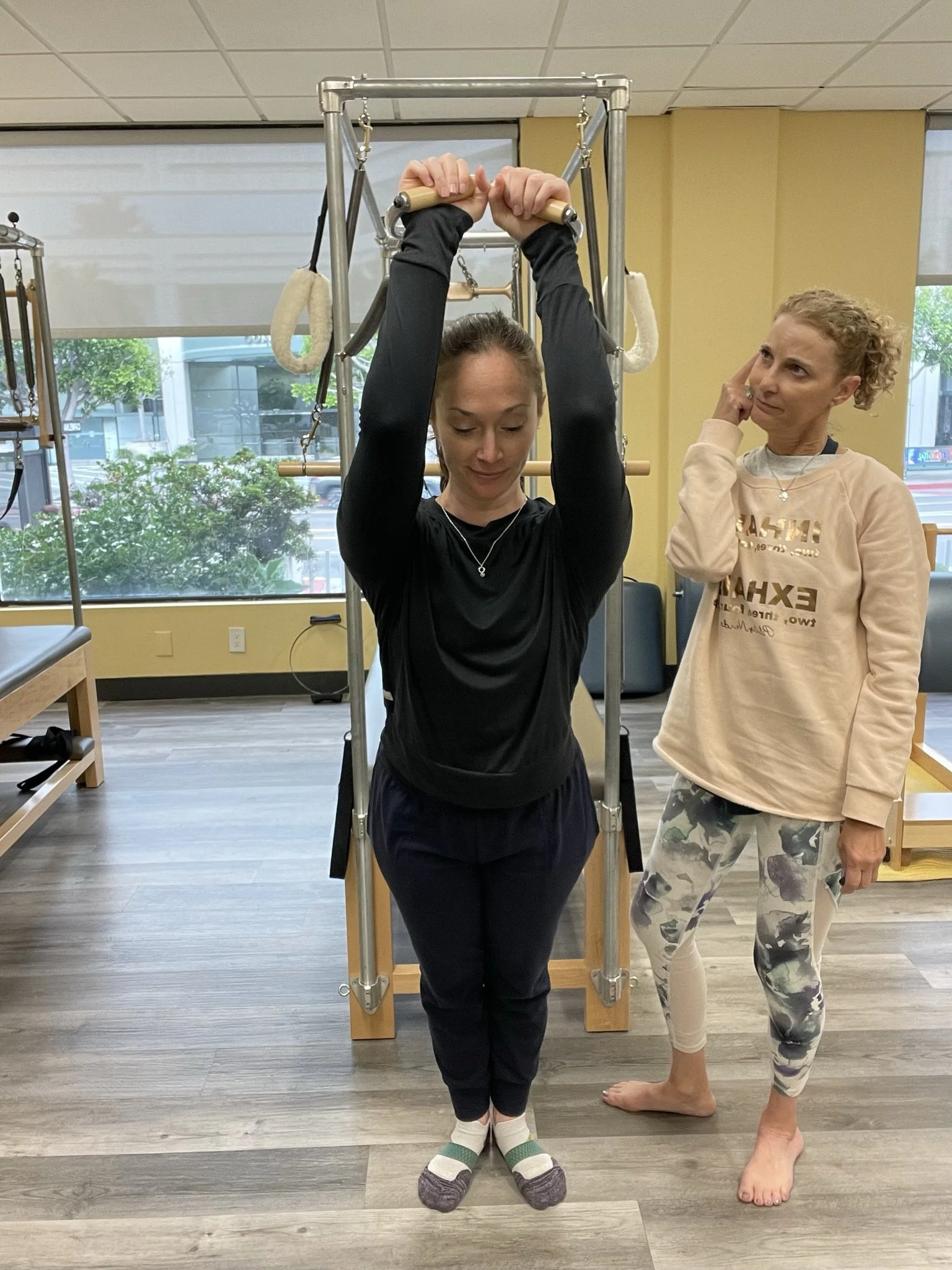 How can Pilates teachers effectively handle demanding clients?