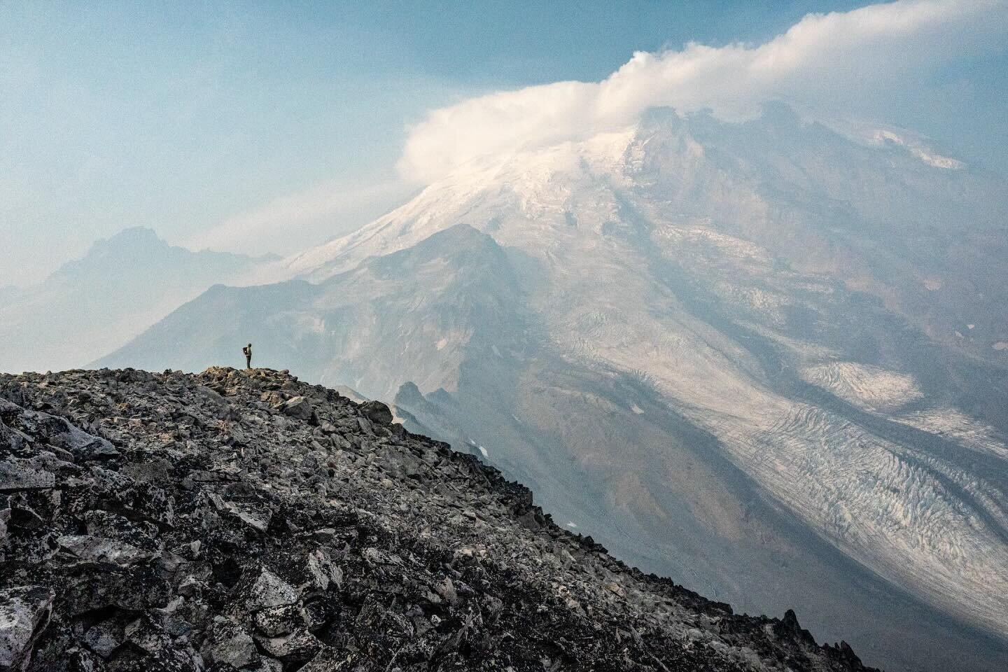 I don&rsquo;t know who this person is, but thanks for posing.

#mtrainier #mountrainier #nationalpark #parks #nps #washington #cascades #cascadia #mtrainiernationalpark #volcano #hiking #burroughsmountain #pnw #pacificnorthwest #summer #smoke #haze #