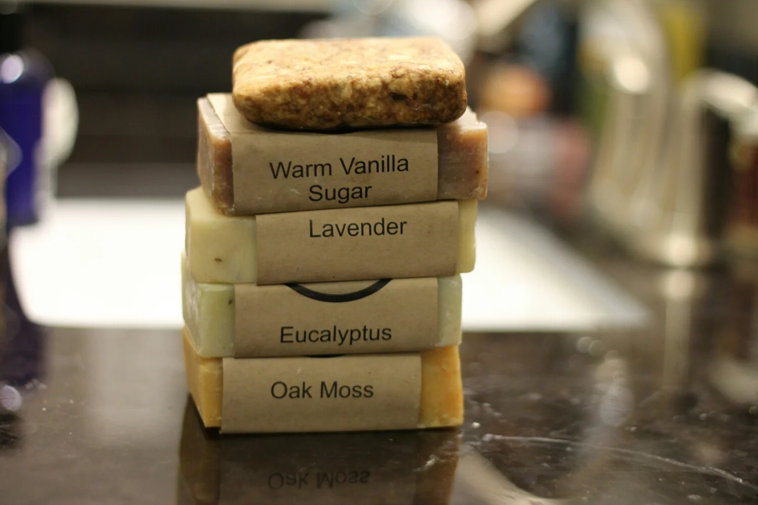 Top to bottom: Black African, Warm Vanilla Sugar, Lavender, Eucalyptus, &amp; Oak Moss soaps from Abundantly Aromatic