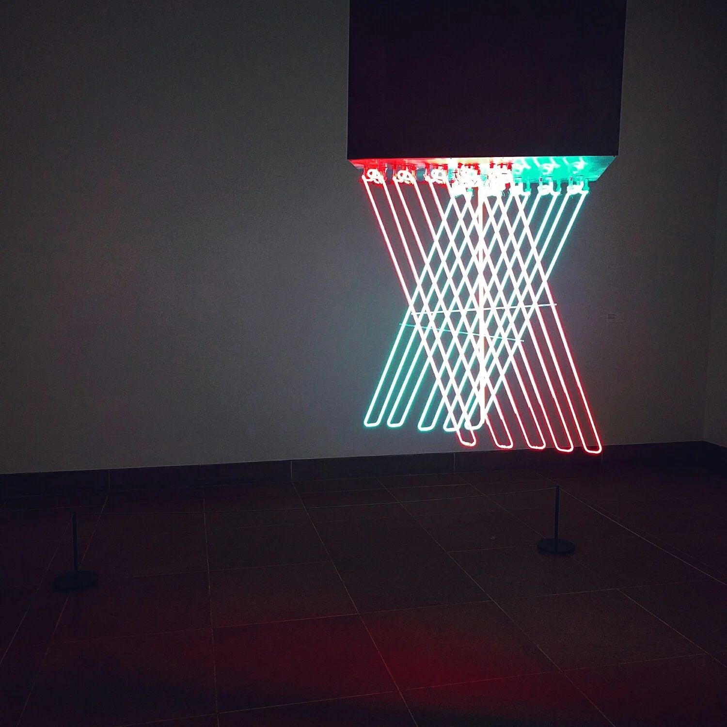  'Hanging Neon'. Stephen Antonakos. n eon & black paint on metal .