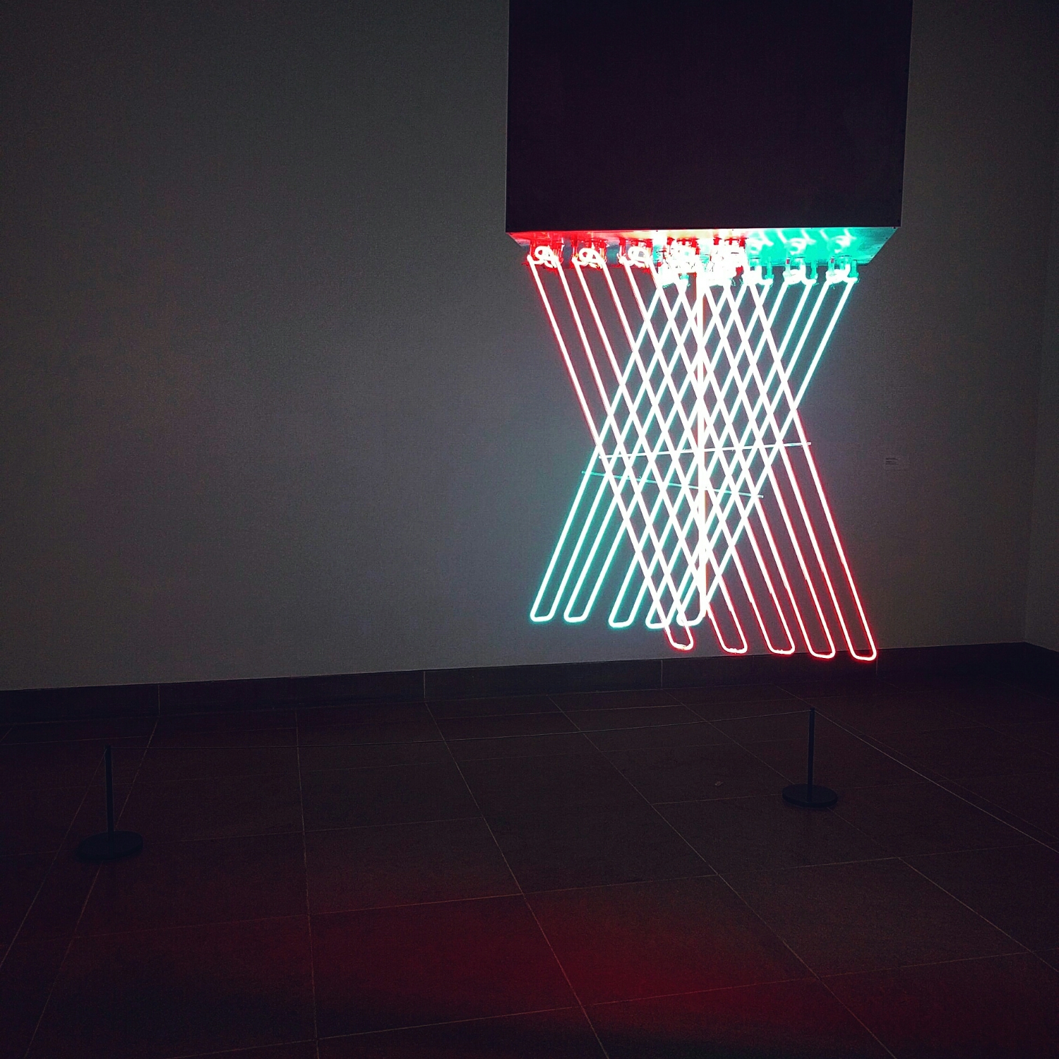 &nbsp;'Hanging Neon'.&nbsp;Stephen Antonakos. neon &amp; black paint on metal .