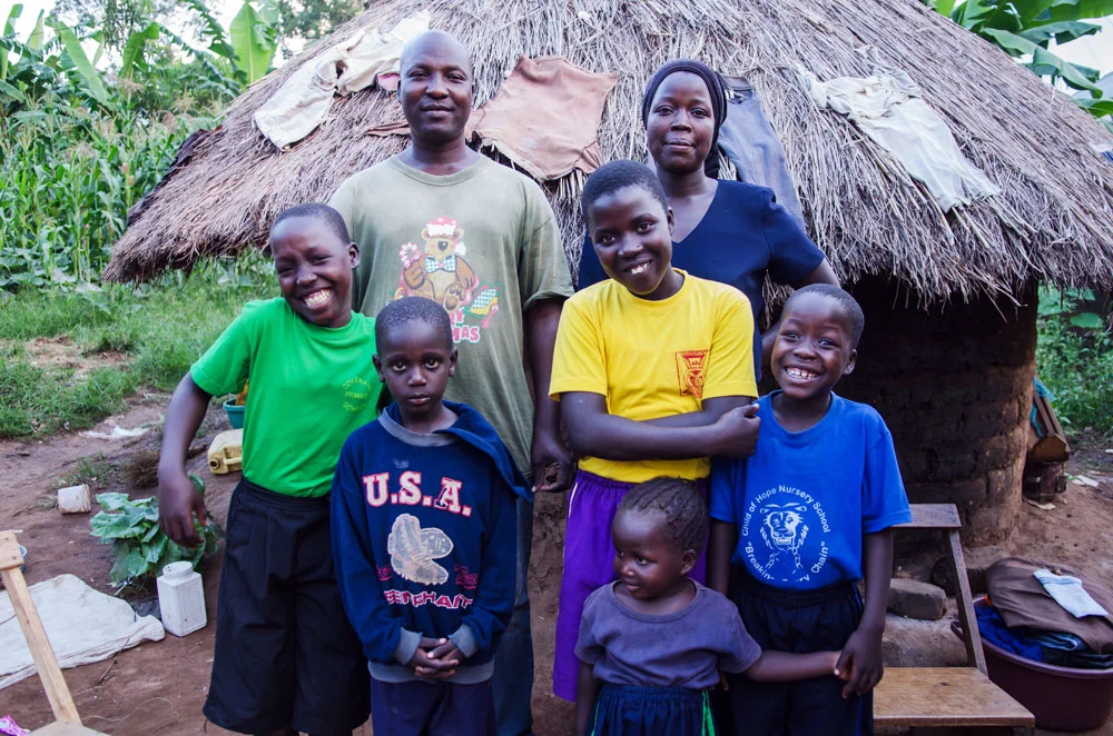 Grace with her husband and children in Namatala. 
