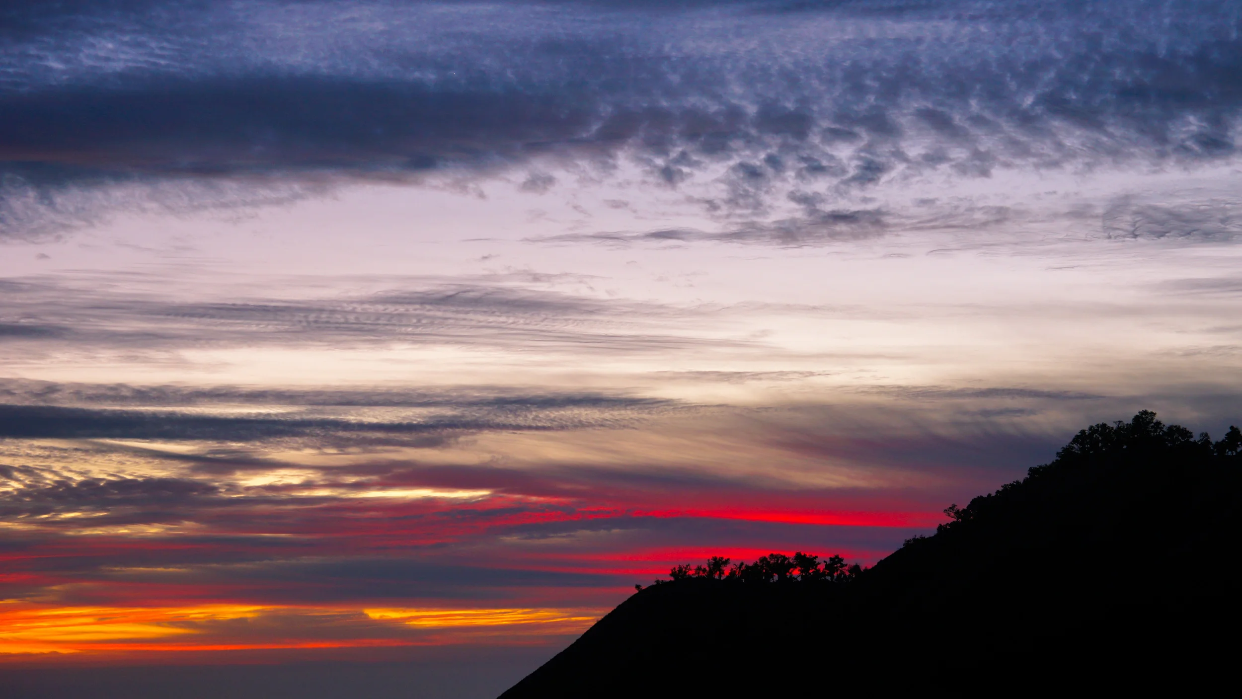   Colors of the Wind  Lingering lights dye the dusk above the Pacific. Big Sur, CA. 