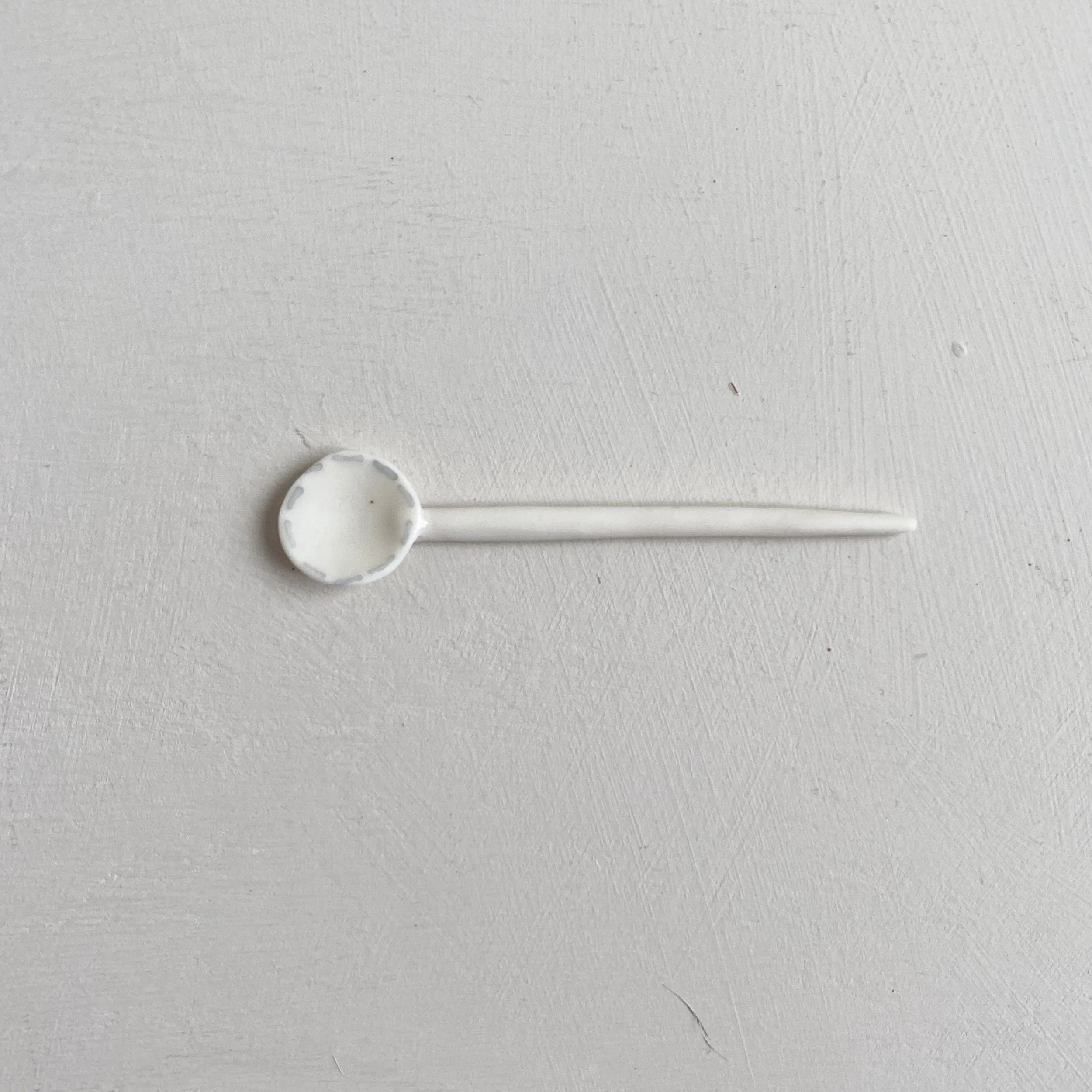 tiny_grey_running_spoon_3.jpg
