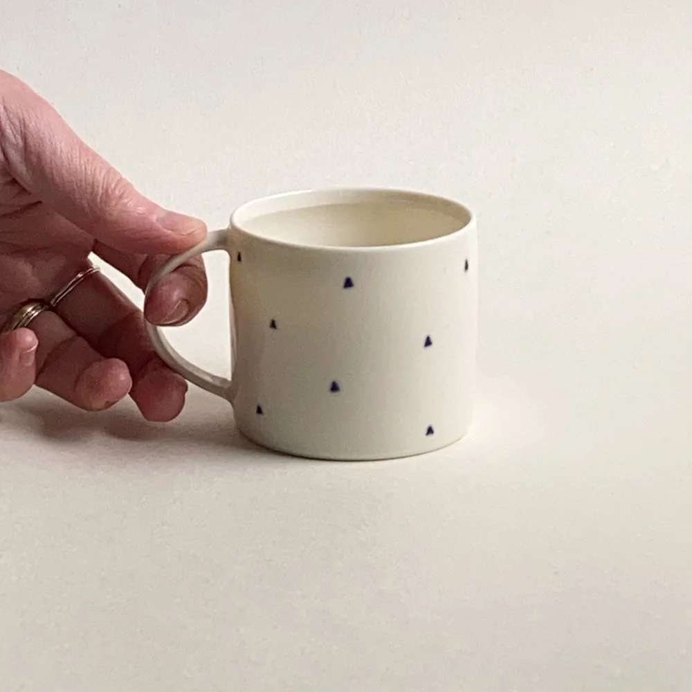 mini_triangle_espresso_hand.jpeg
