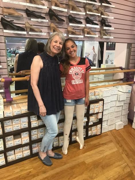 Mrs. Rogers takes each Still Pointe student for their very first pointe shoe fitting. 