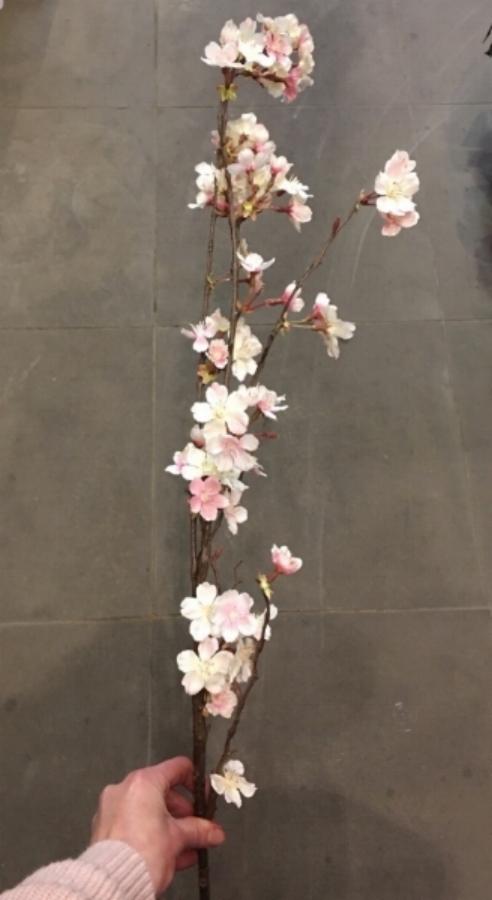 Go faux - the 'Fake it' faux cherry blossom stem is available in pale pink or white. It brings a soft nod to springtime into your home.