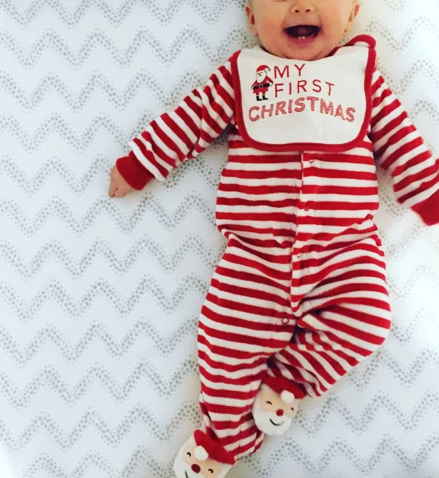 {Love this perfectly cheesy onesie- I plan on giving her a pair of Christmas pjs each year} 