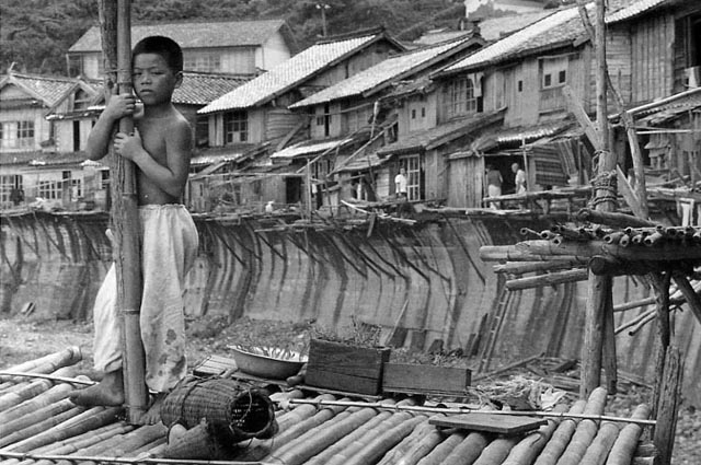Shigeichi Nagano. Boy in front of his fishing village. Shimane peninsula, 1953.