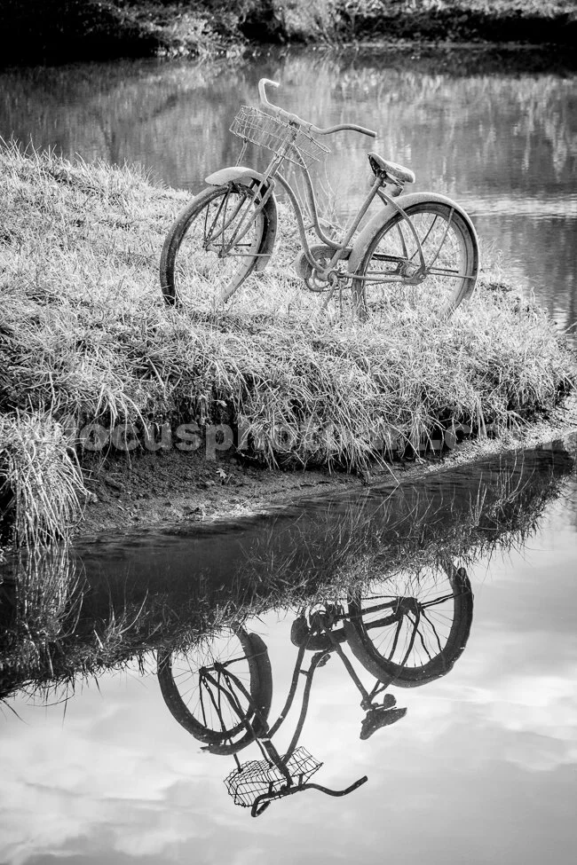 J16_Reflection_of_a_Girl_s_Bicycle_4378_BW.jpg