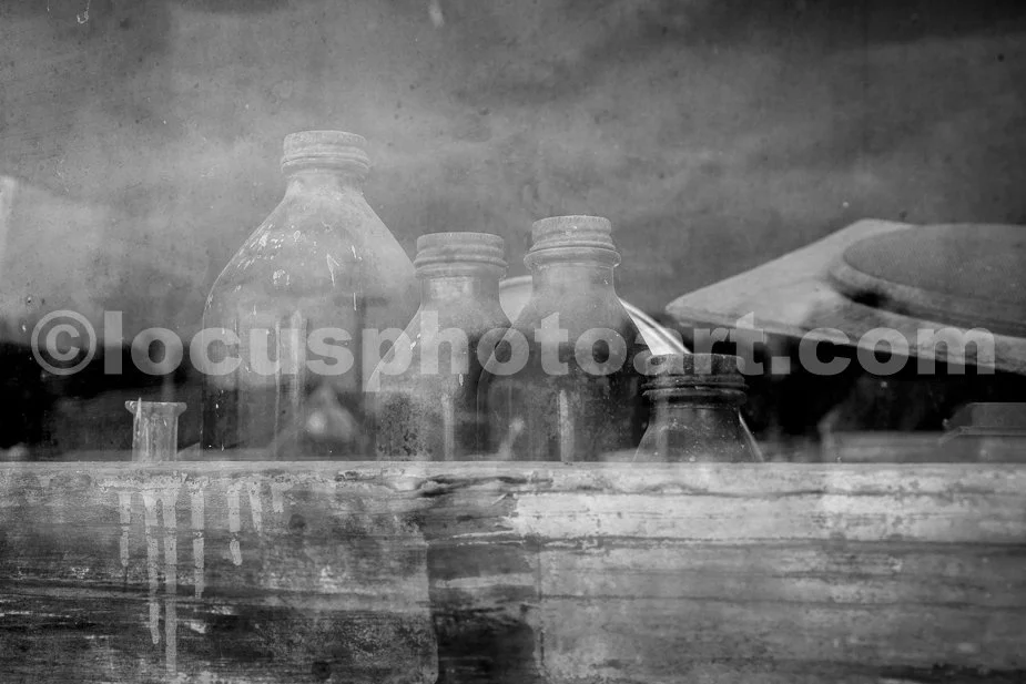J21_Bottles_in_the_Feed_Store_Window_8322_BW.jpg