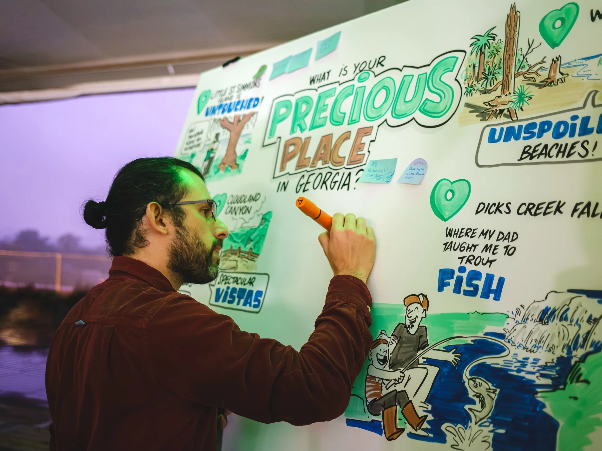 Alejo drawing an interactive board live at the Georgia Conservancy gala in Atlanta, Georgia.