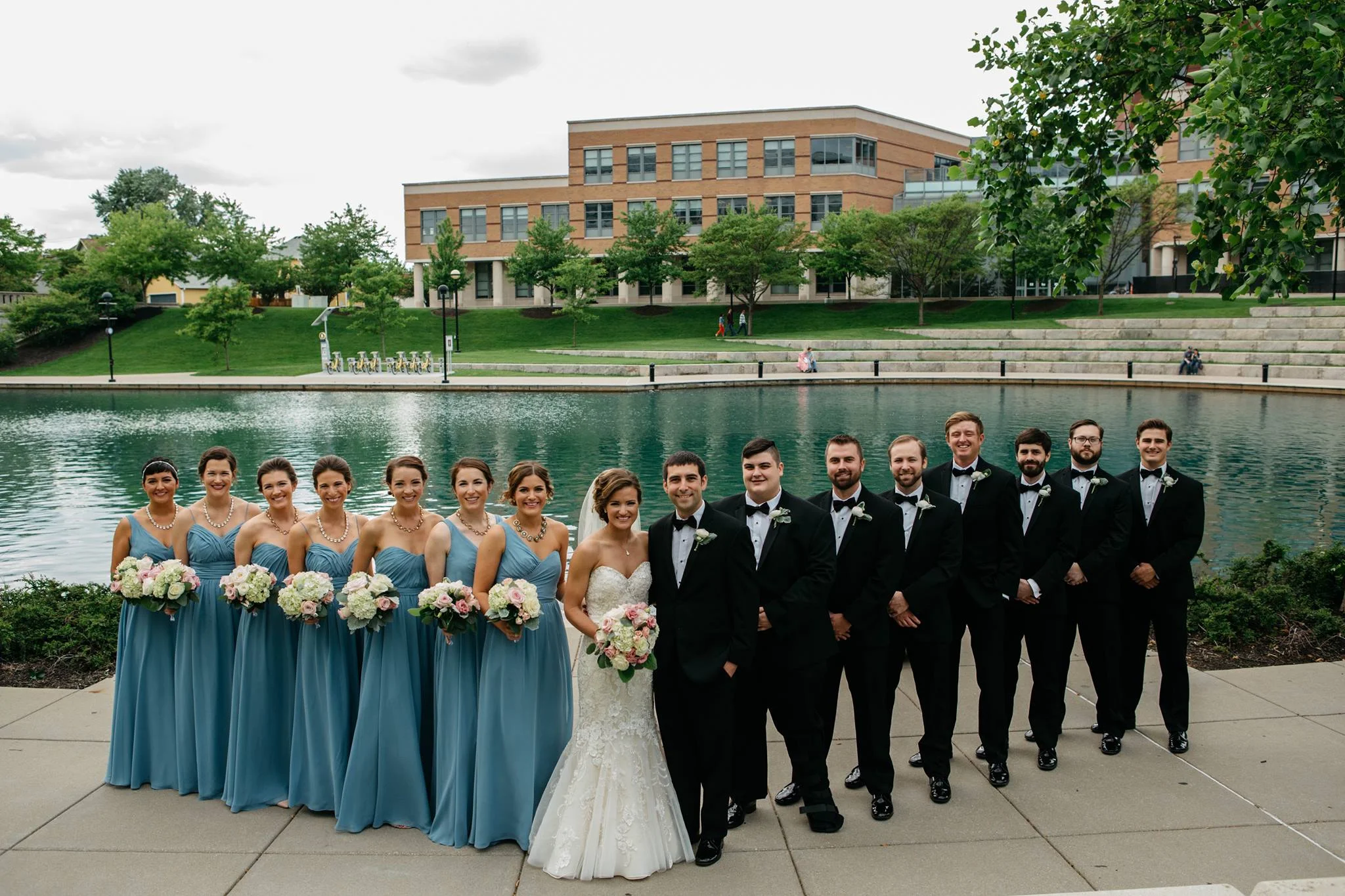 It's a family affair -- when the groom's family owns a bridal shop you know everyone in the bridal party was outfitted by Treat's. Congrats to Kayla and Tim! Photo by Gretchen Robards Photography .
