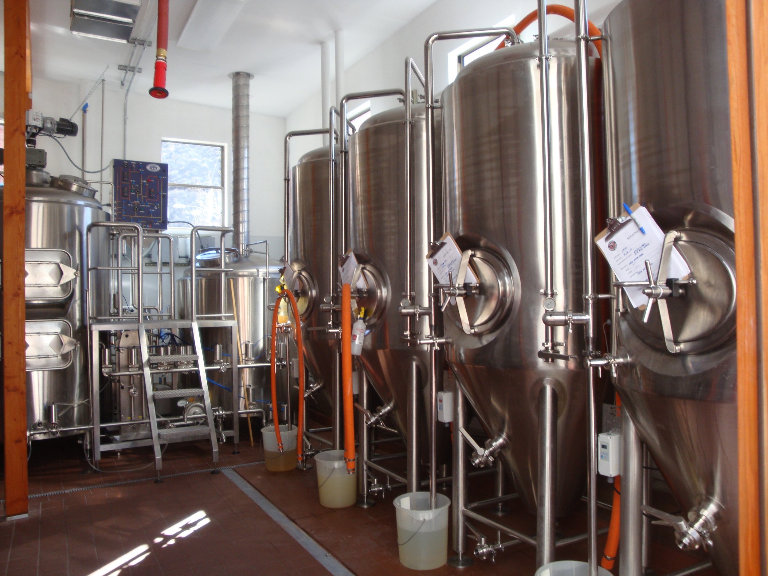  three beer brewing tanks 