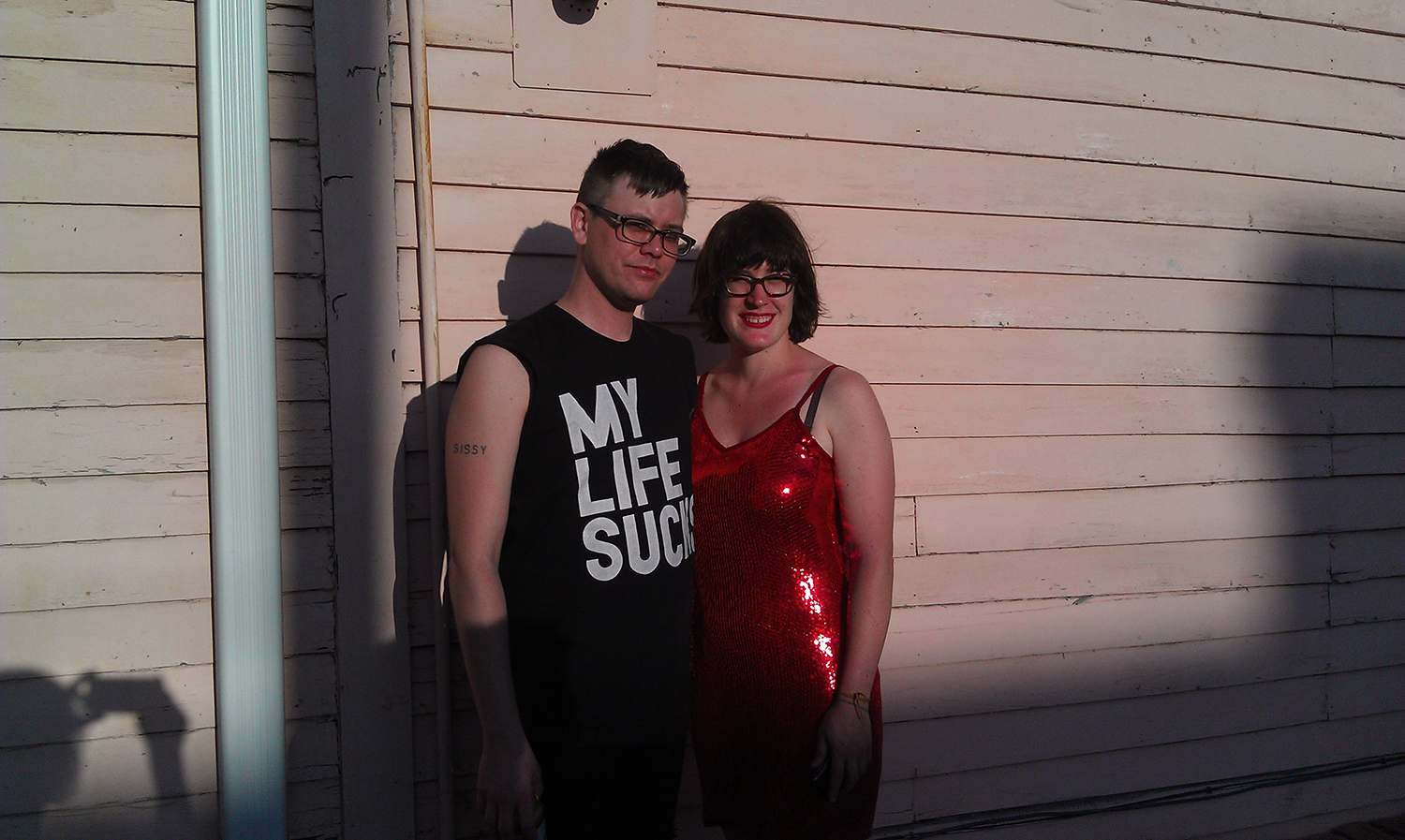 Leah and Andrew by house.jpg