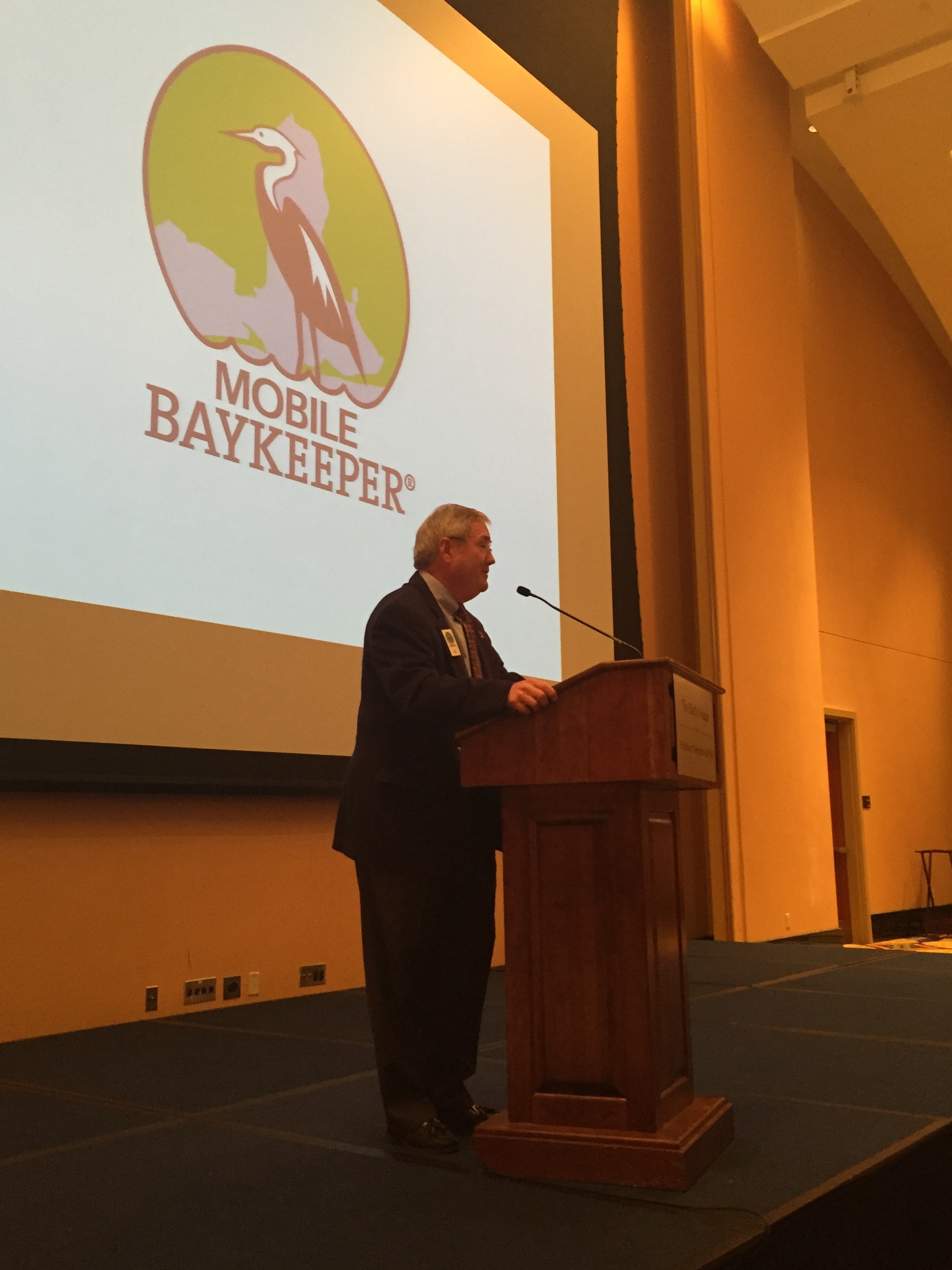 Board Member and Past President Ray Mayhall encourages guests to become more engaged with Mobile Baykeeper. 