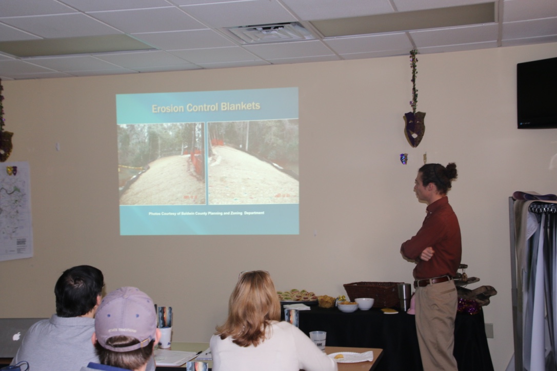 Muddy Water Watch workshop participants learn about stormwater controls.