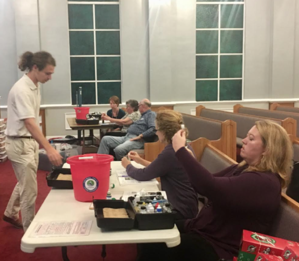 Program Director Cade Kistler trains adults at Hollinger's Island Baptist Church to be certified water quality monitors through Alabama Water Watch. 