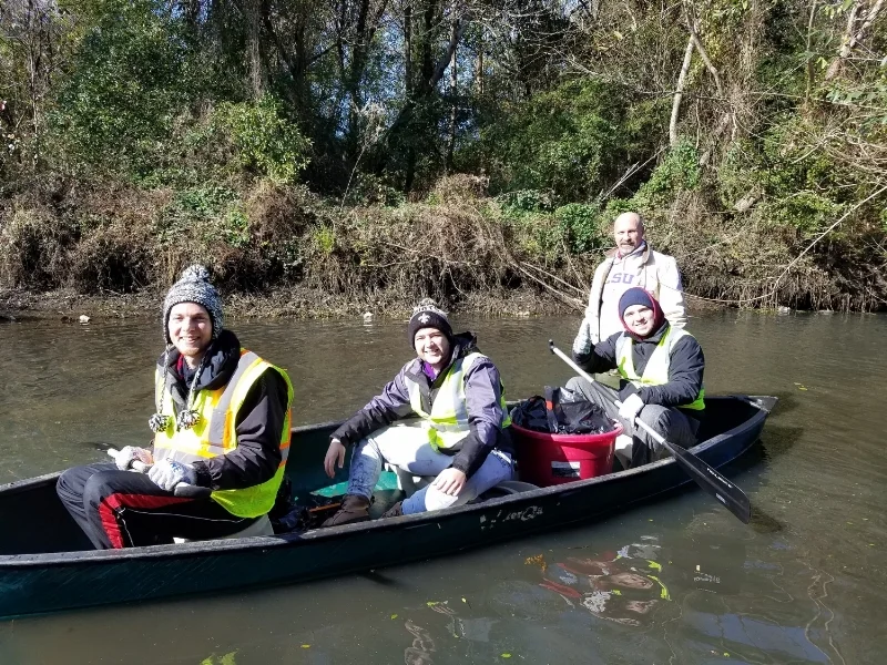 Volunteers on the water at the One Mile Creek site.