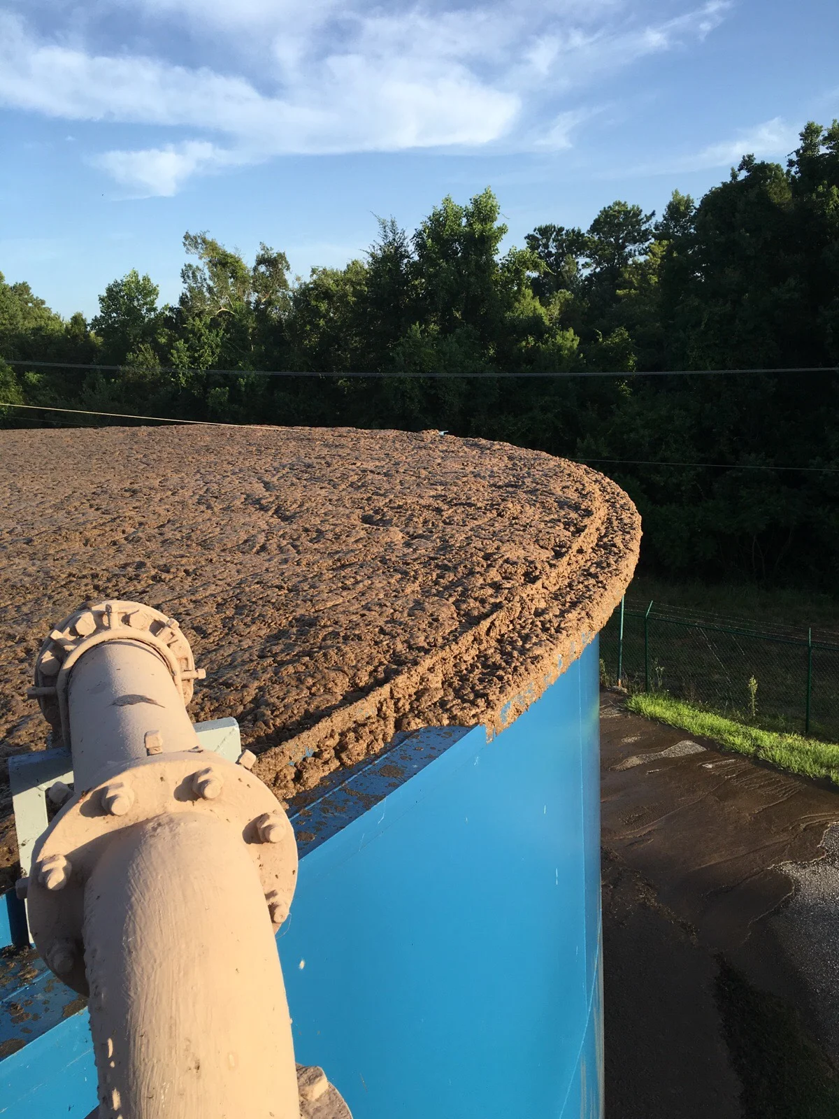 Above: The aftermath of an underreported shown spill at Daphne Utilities.