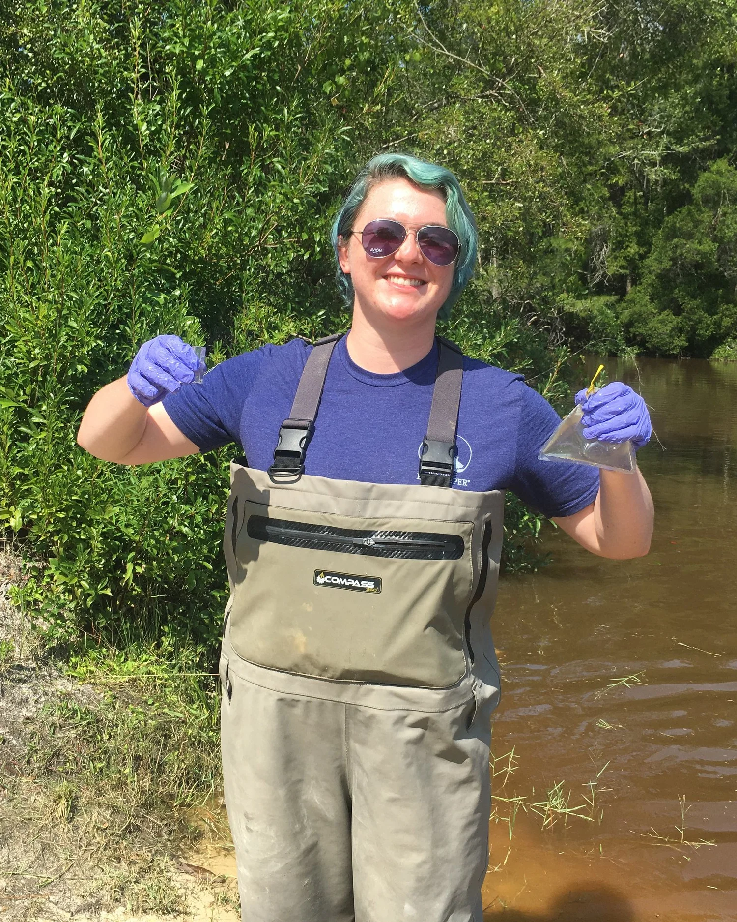 Lizzie Simon taking water samples