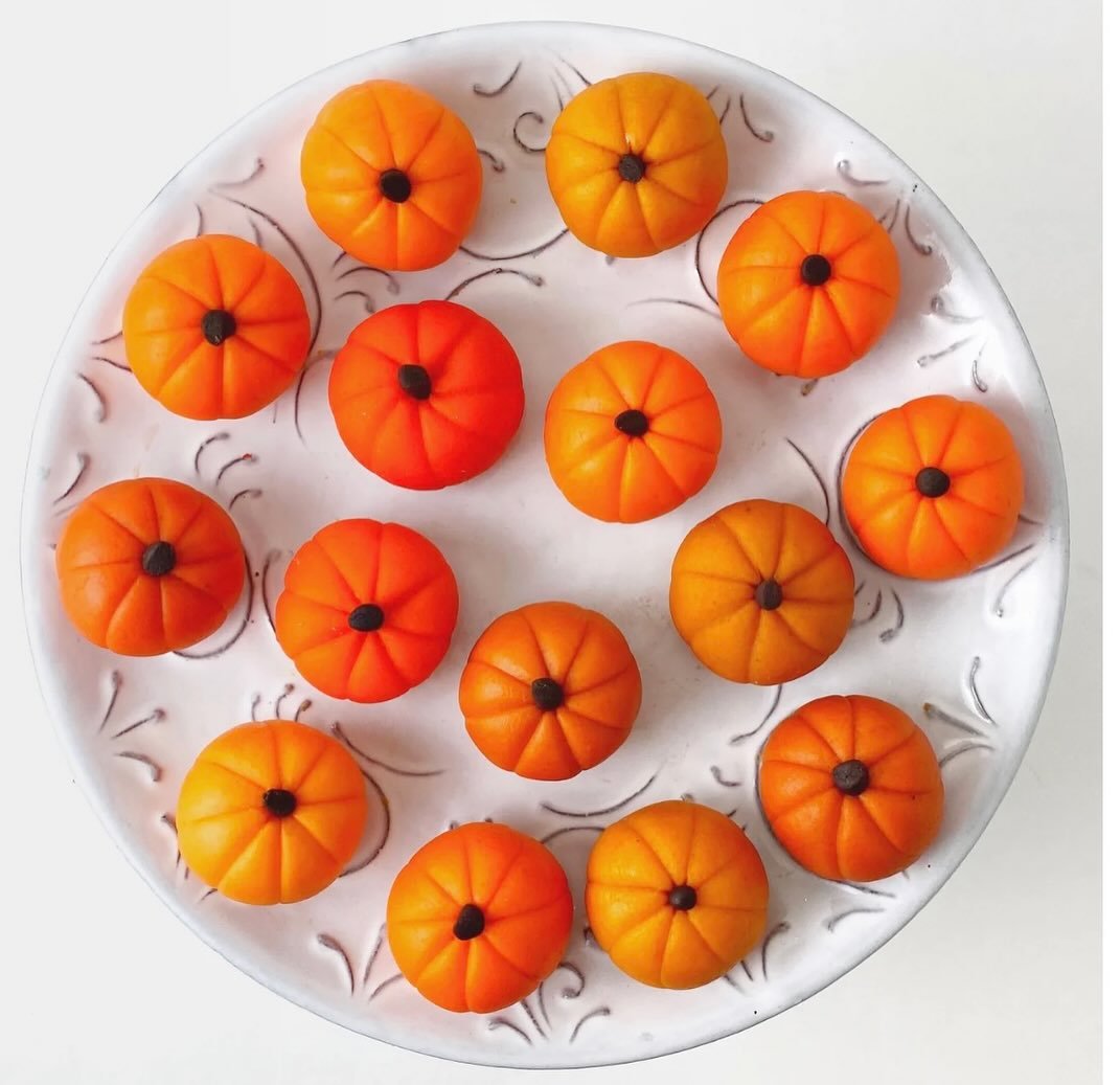 Celebrate autumn, fall and Thanksgiving with this collection of plump and delicious pumpkin sculptures, designed in a variety of shades of orange.

These treats are sculpted from marzipan, which contains almonds, which are tree nuts. Marzipan contain