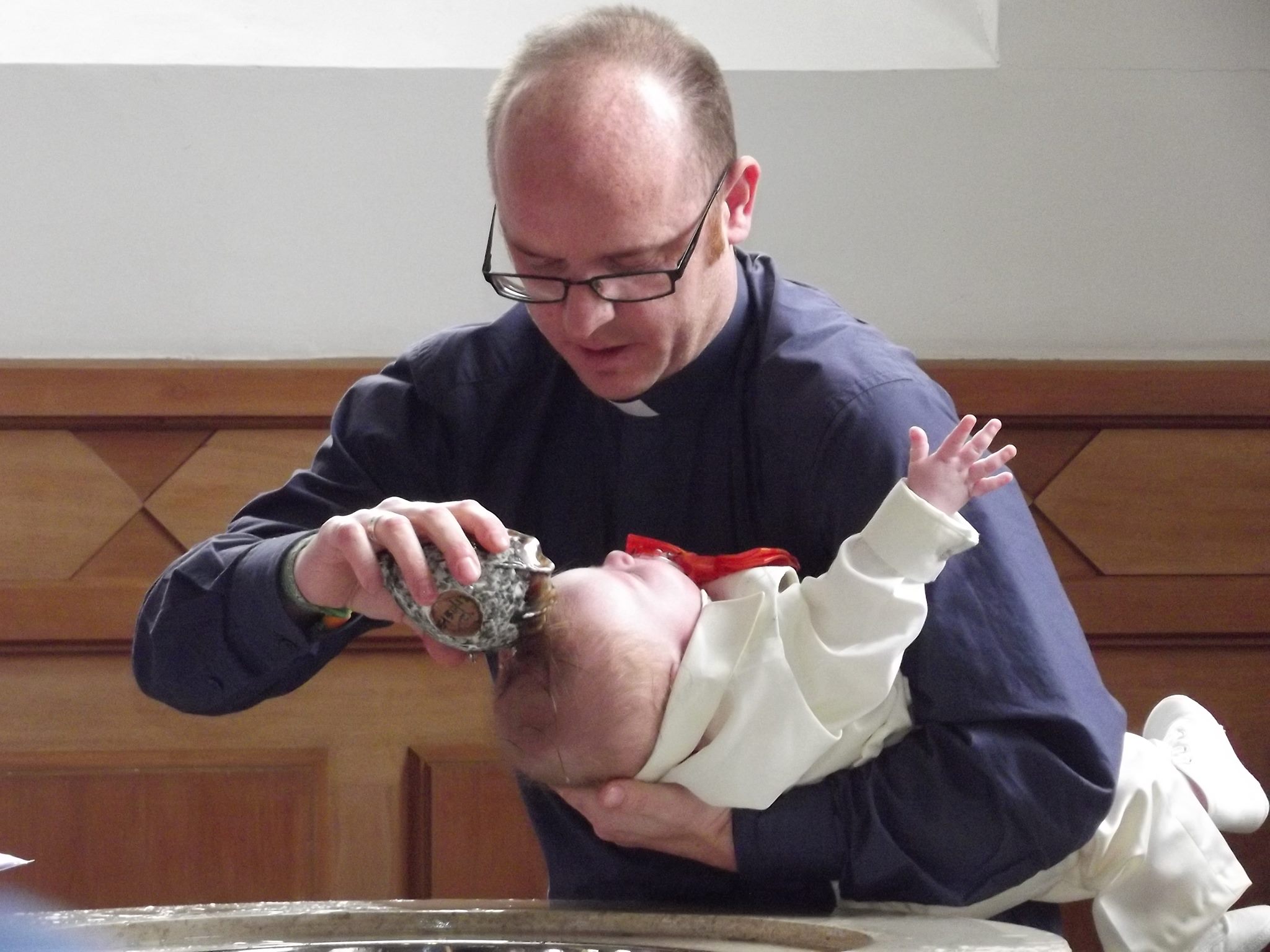PHOTO Lee baptising Joey McLeod.jpg