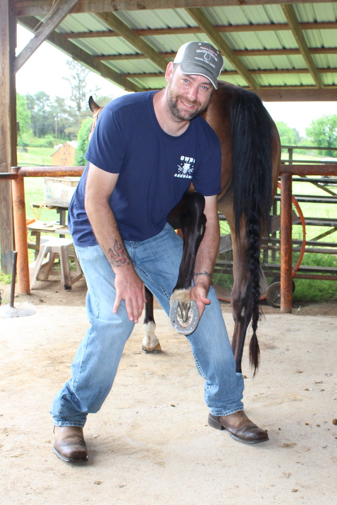 Robert Serzanin, Veteran of MI, new Certified Farrier, EFT, Reining competitor with his 3 year mare in training he learned to shoe with sliding plates while at Casey Horseshoeing School in GA.