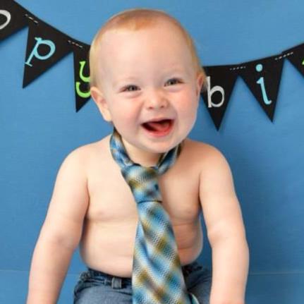 My son on his first birthday - a lot less hair, but he still looked good with a tie.