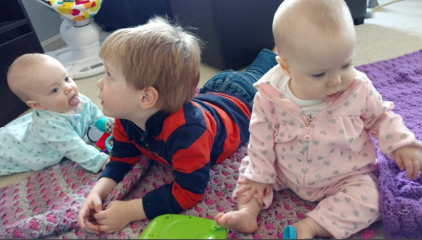 Elliott hanging out with his sisters